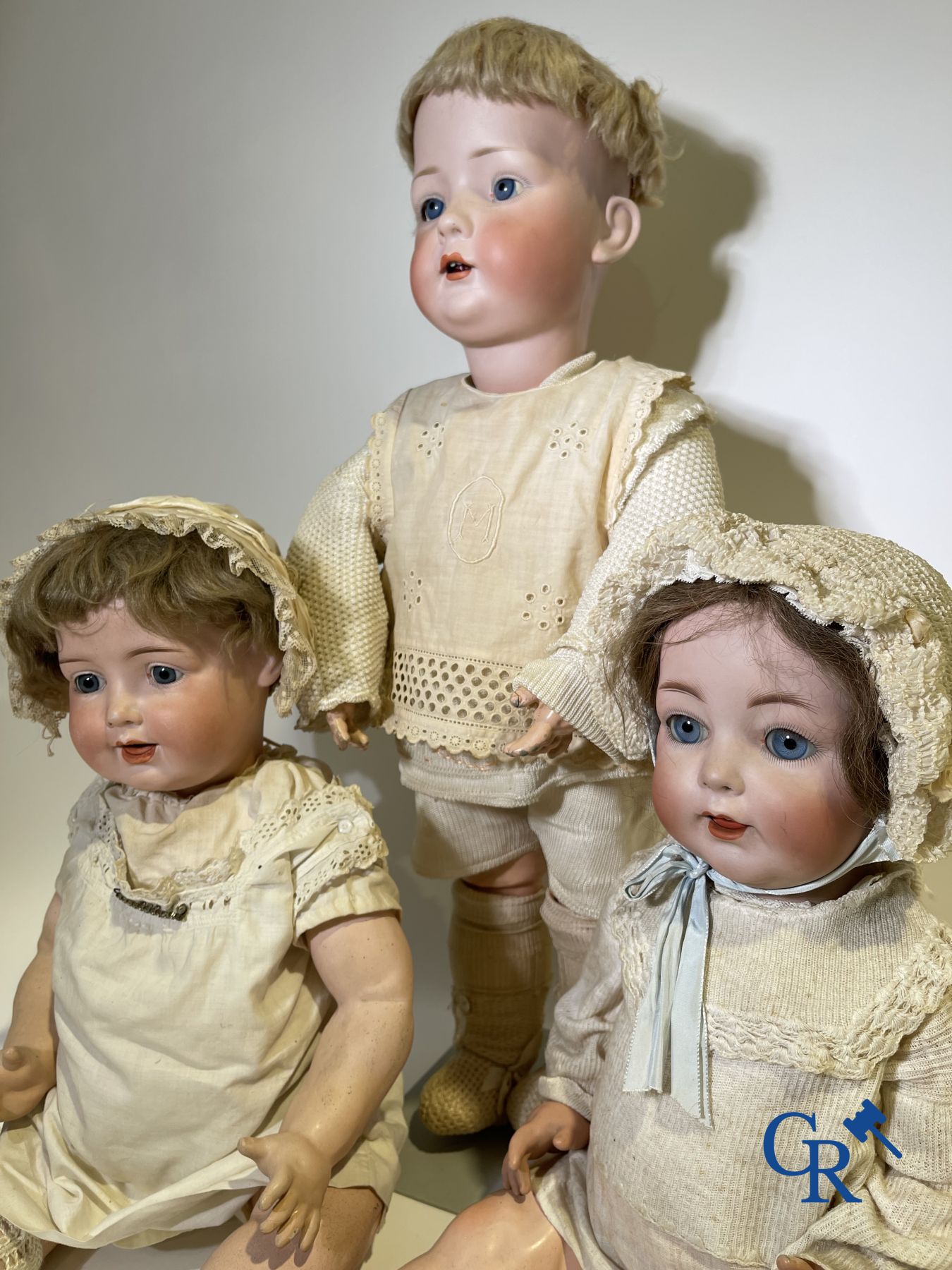 Toys: antique dolls: a lot of 3 antique dolls with porcelain head.