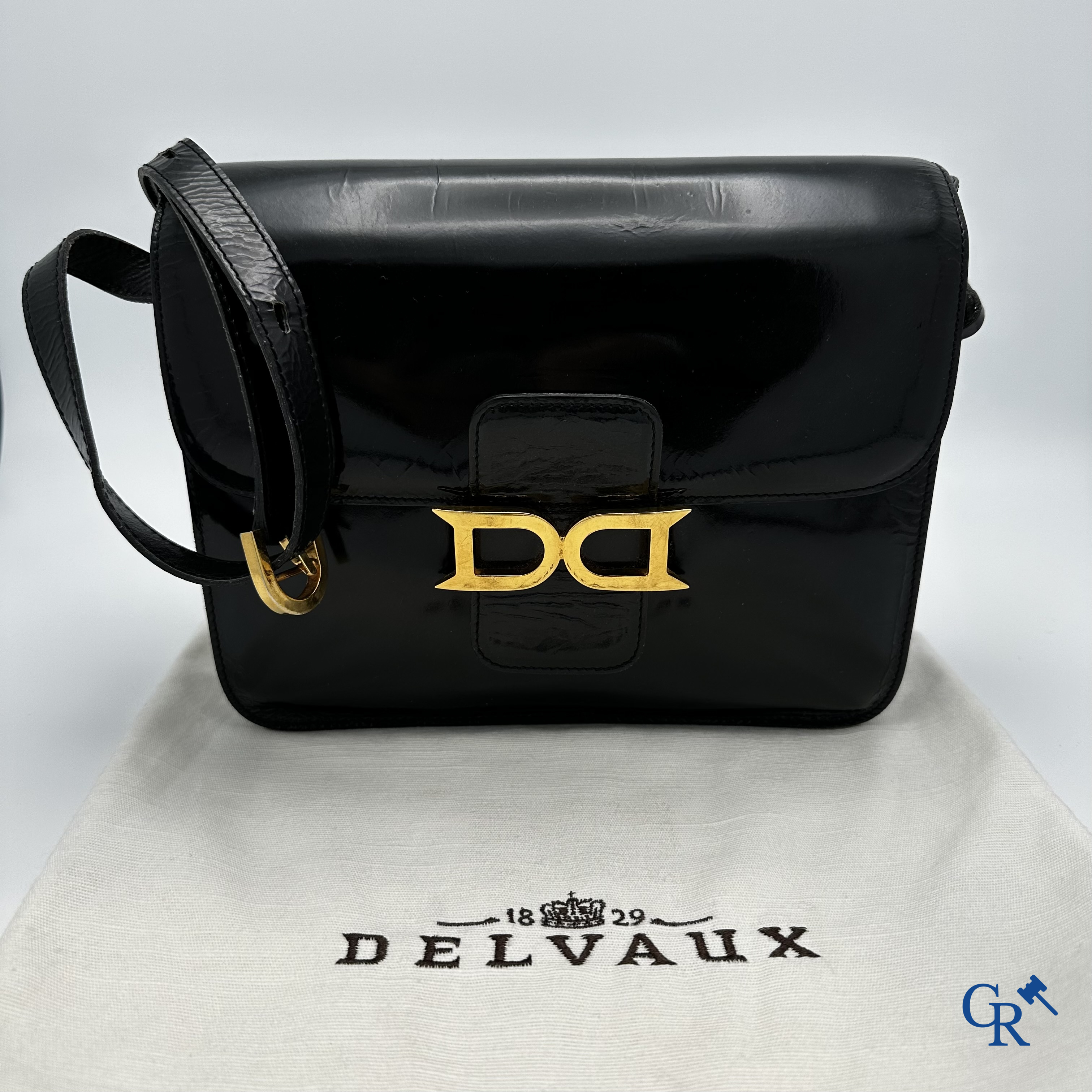 Delvaux: Handtas in zwart leder.