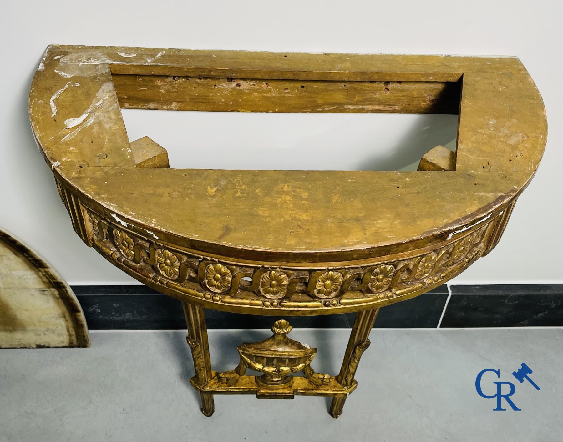 Furniture: Wood sculpted and gilded crescent shaped console. LXVI-period.