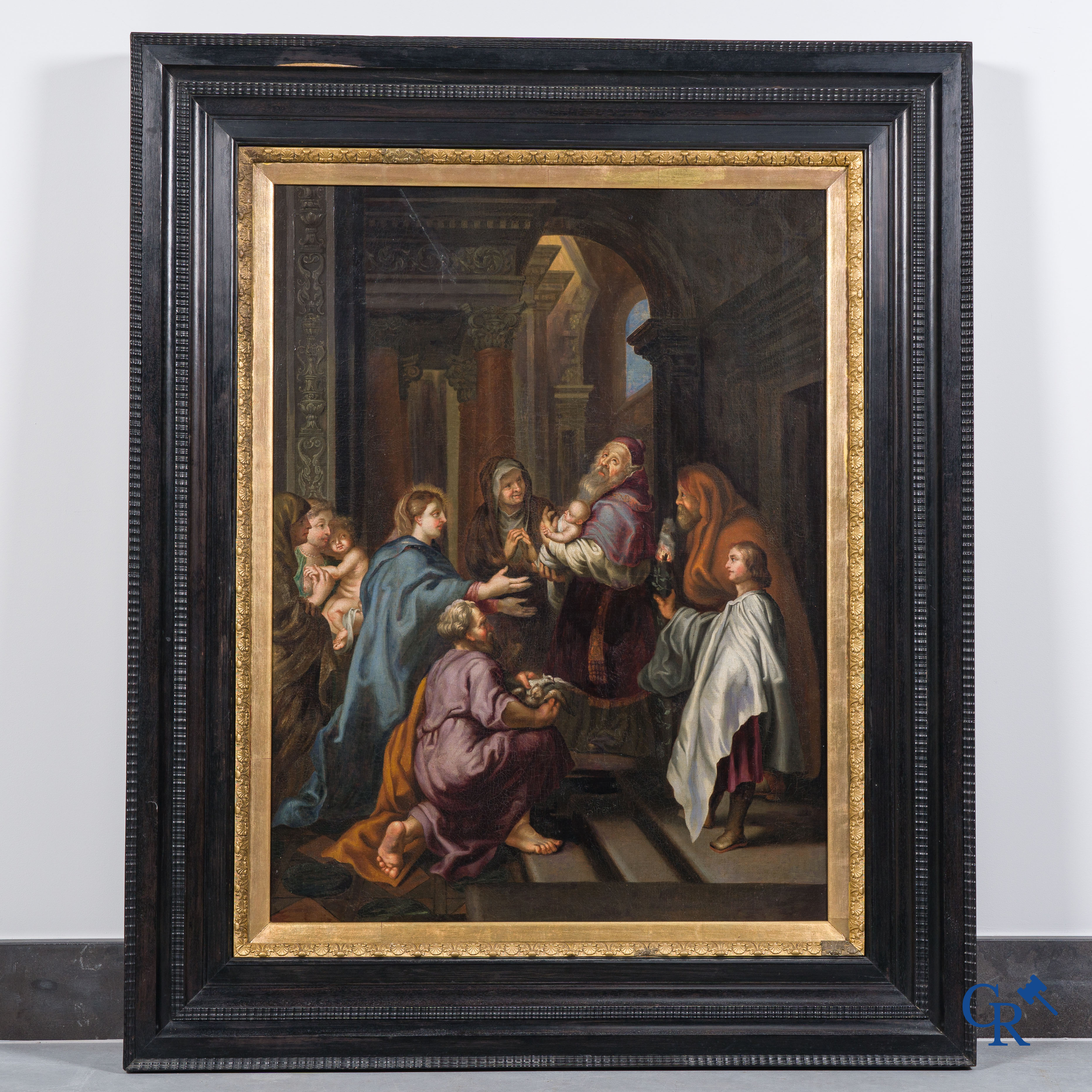 Religious painting, the adoration of the Christ Child in a large ebony veneer frame. Oil on canvas. 18th century.