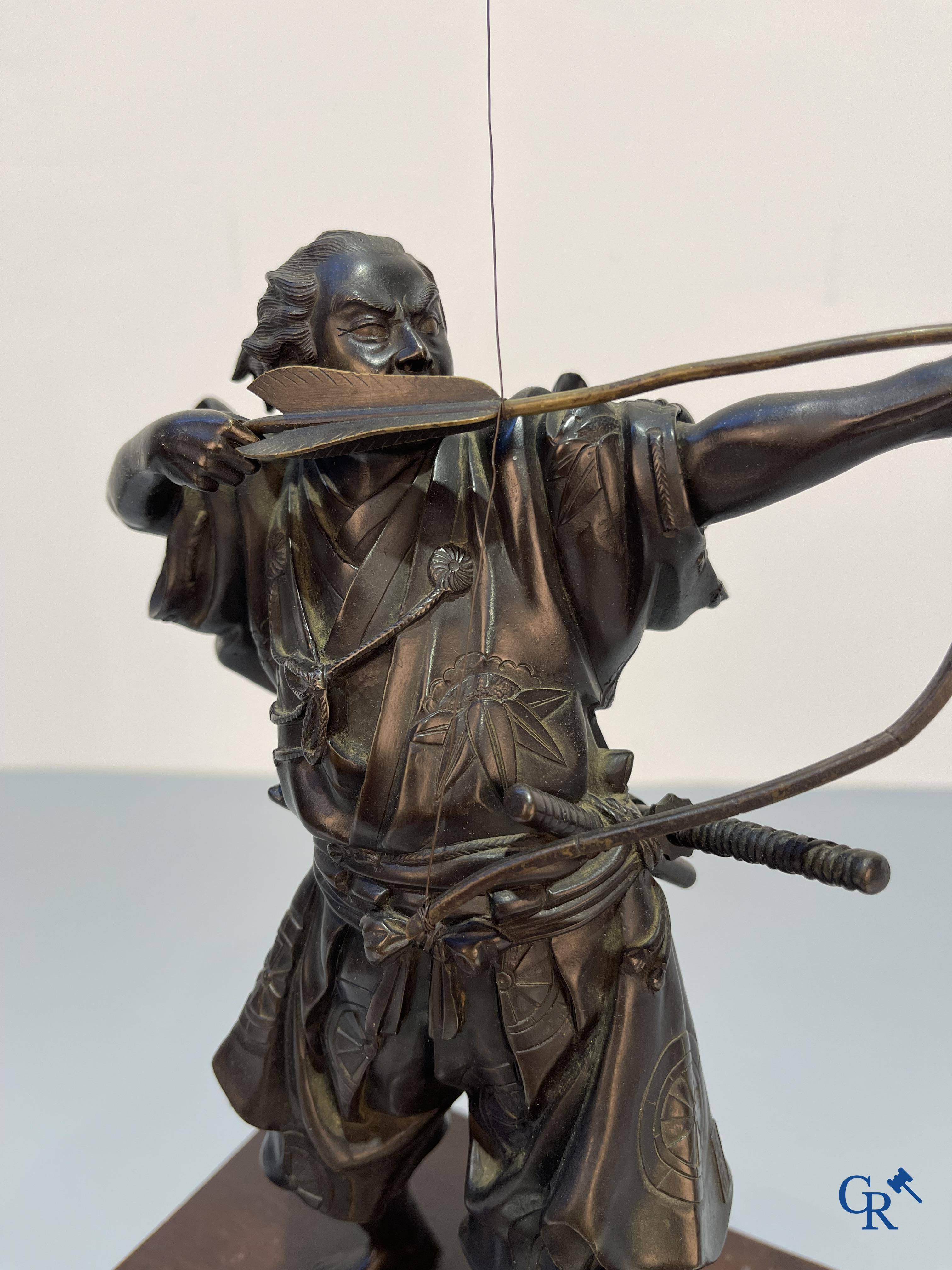 Asian Art, Japanese art, a bronze representation of a Samurai archer. Signed. Meiji period.