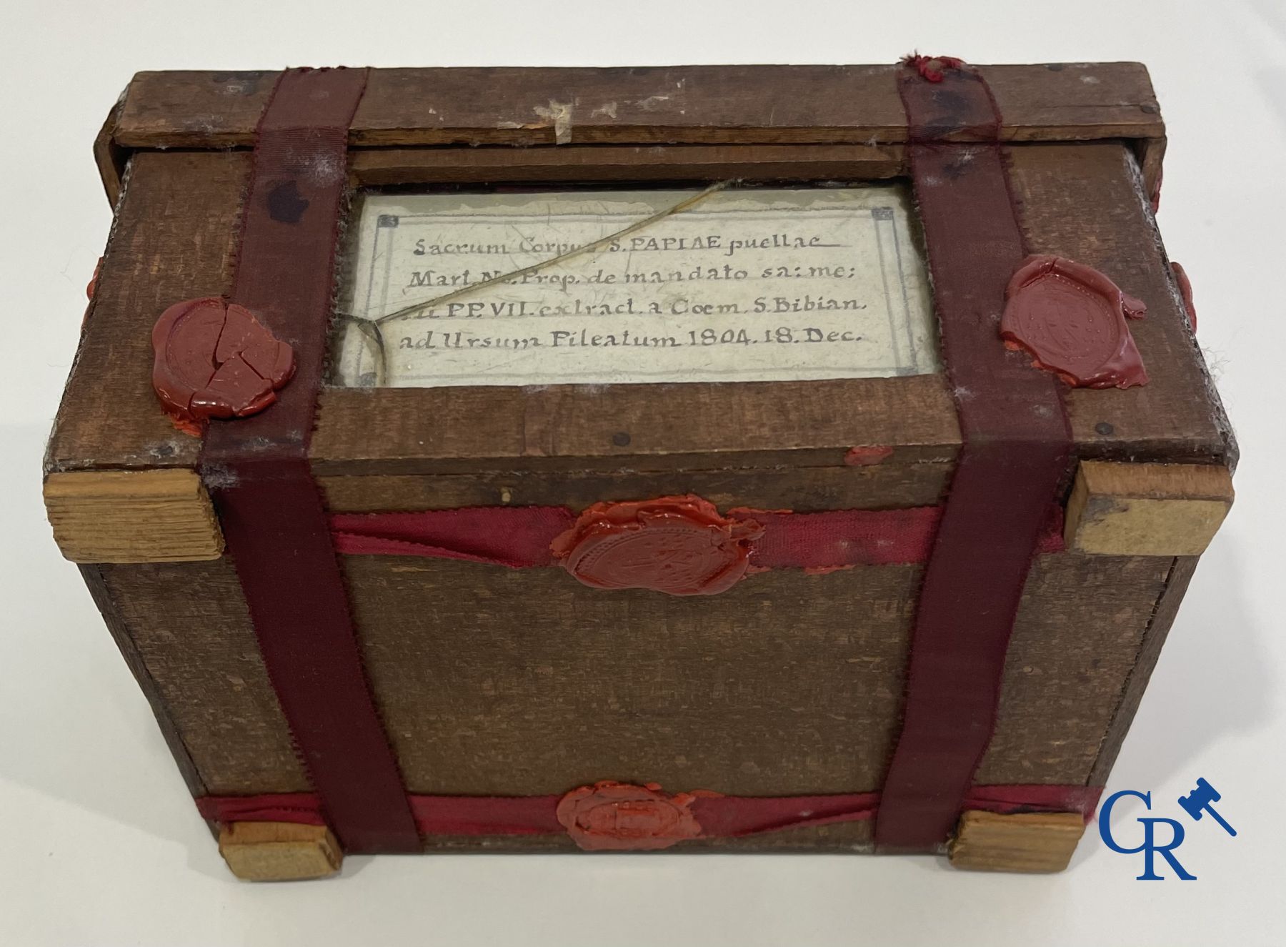 An antique wooden reliquary sealed with wax seals. Early 19th century.