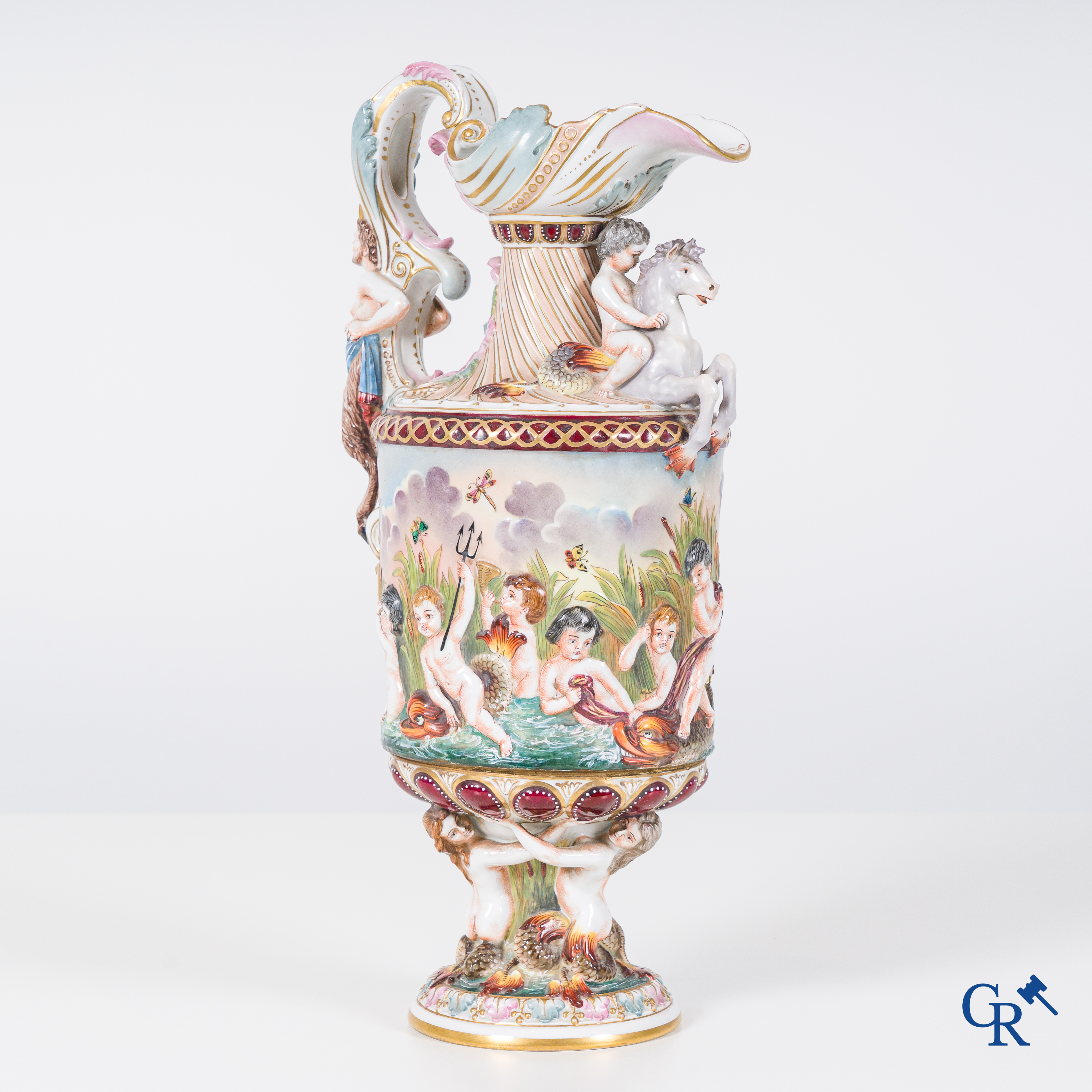 A richly crafted Renaissance-style jug or Aiguière in Naples porcelain. Late 19th century.