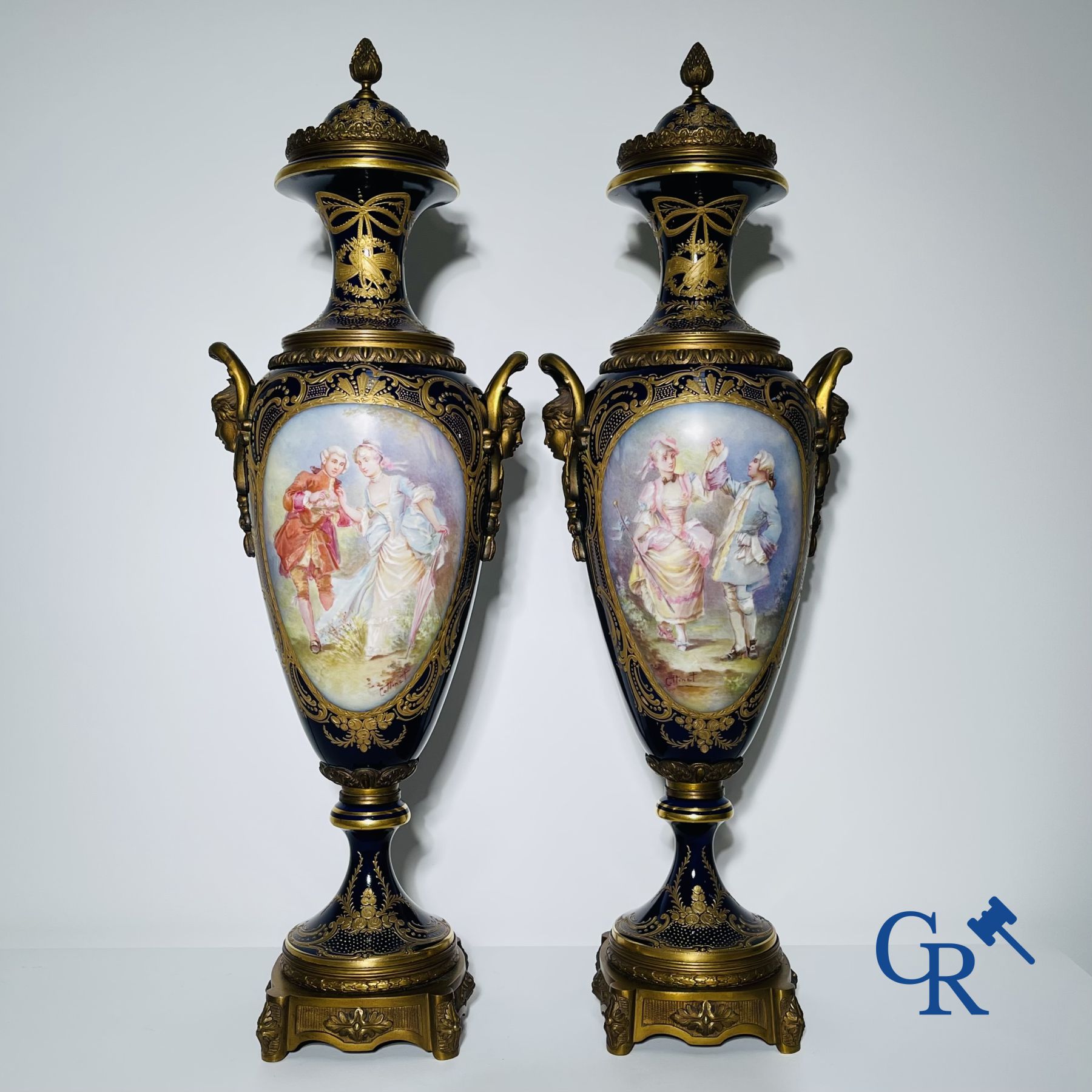 Porcelain: Sèvres: Pair of large bronze mounted vases in Sevres porcelain.