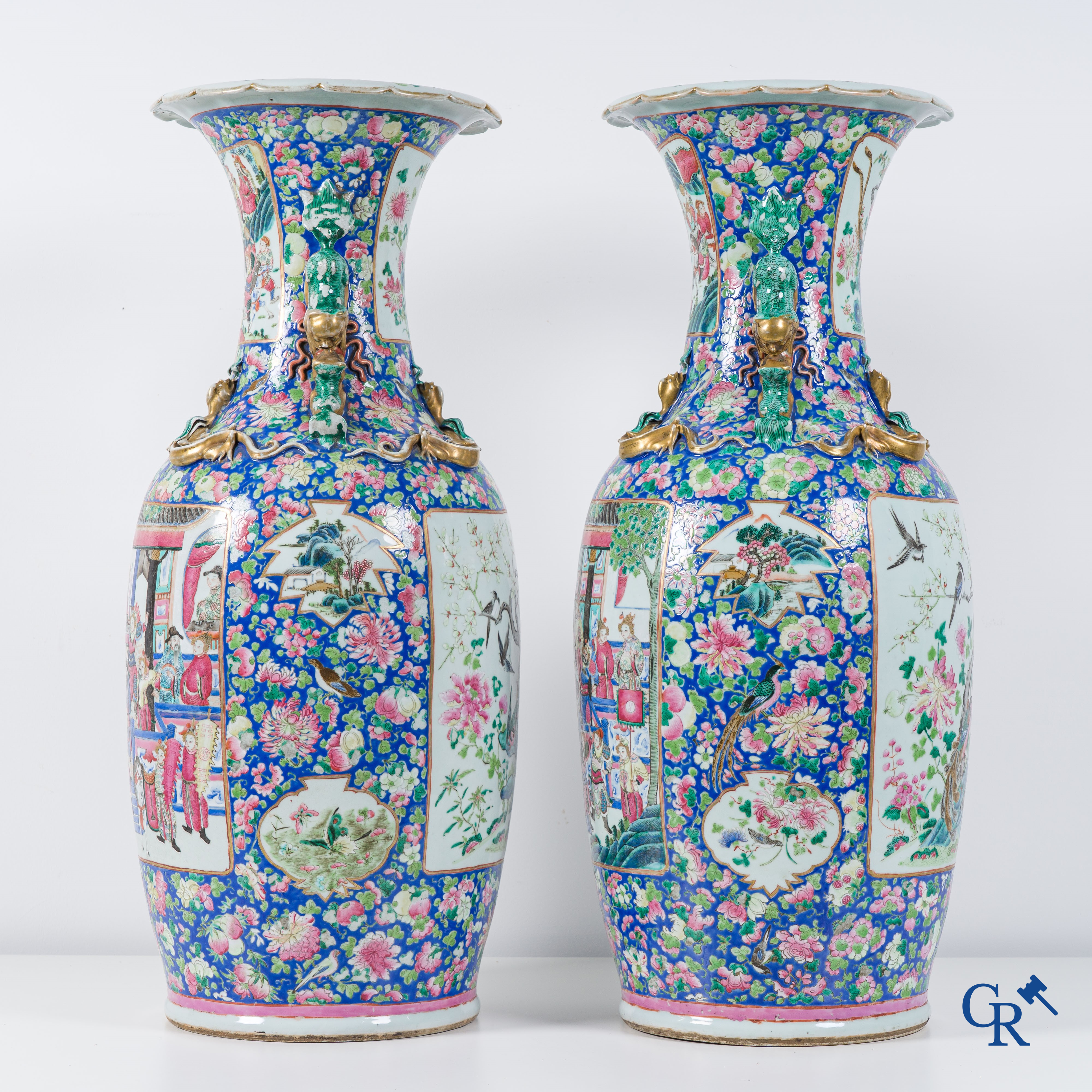 Asian Art: Chinese porcelain. A pair of imposing Chinese vases with famille rose decor. China 19th century.