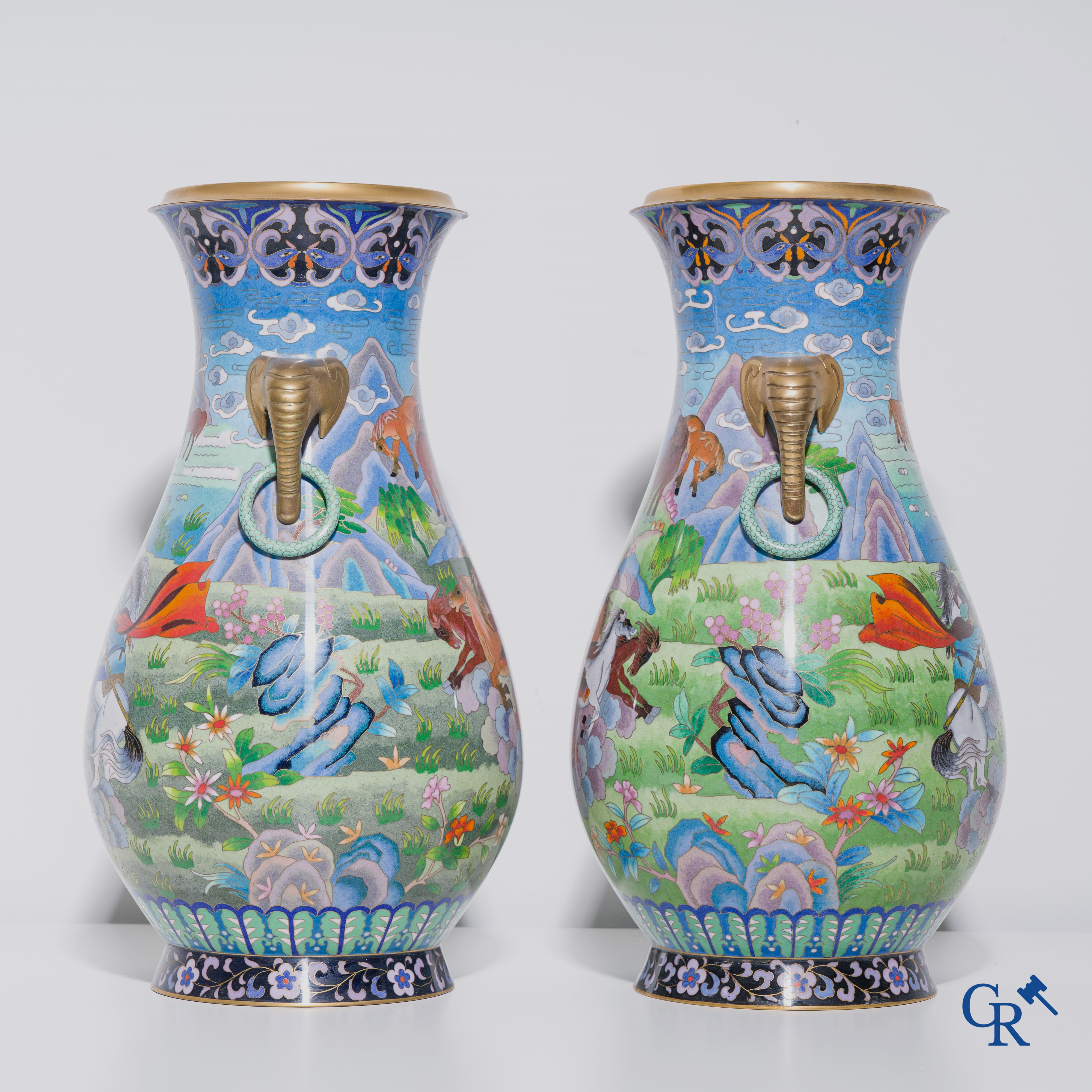 A pair of vases in Chinese cloisonné enamel with a decor of horses, circa 1980.