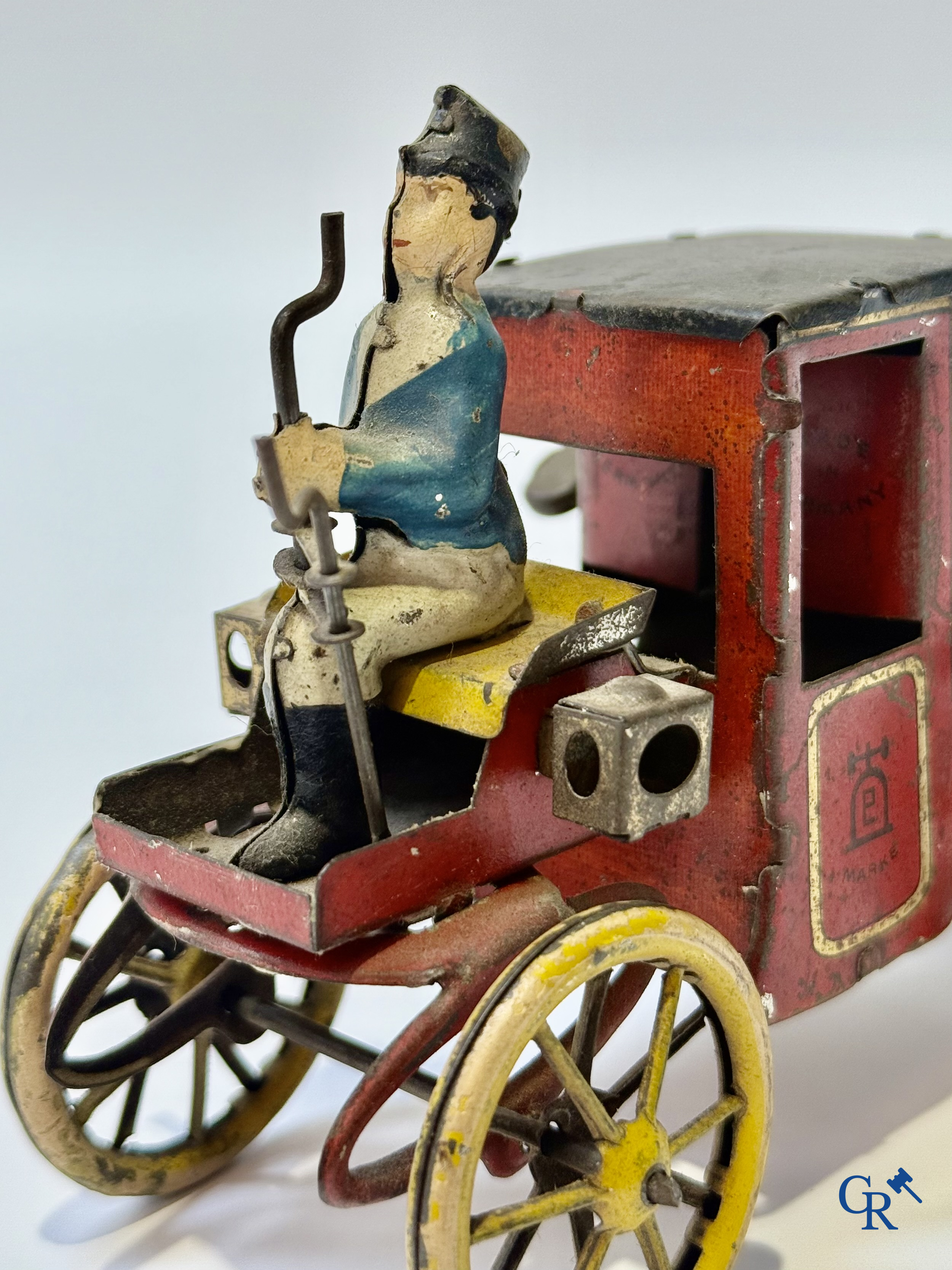 Lehmann, "Motor Kutsche" mechanical toy in painted tin. Germany circa 1906.