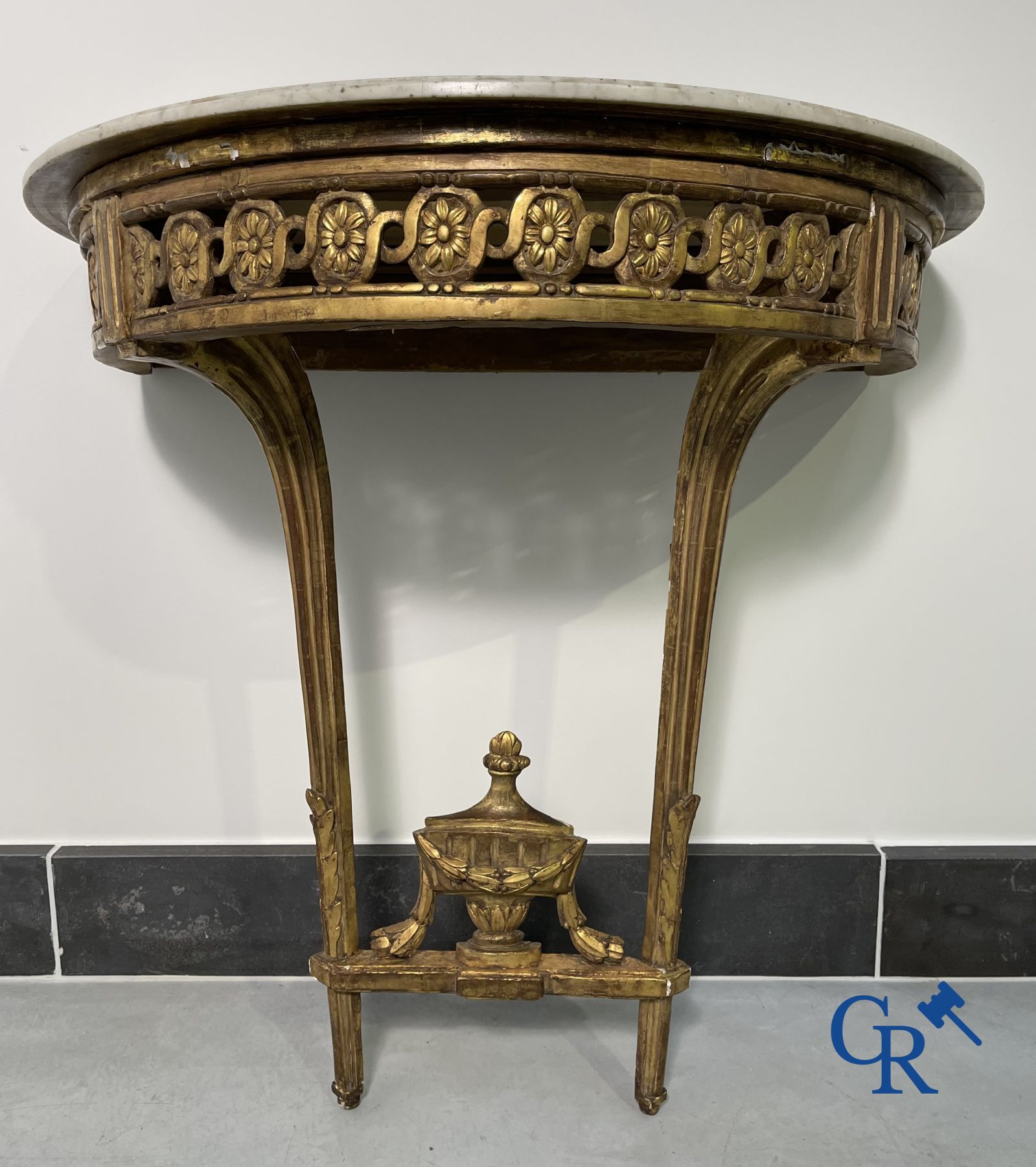 Furniture: Wood sculpted and gilded crescent shaped console. LXVI-period.