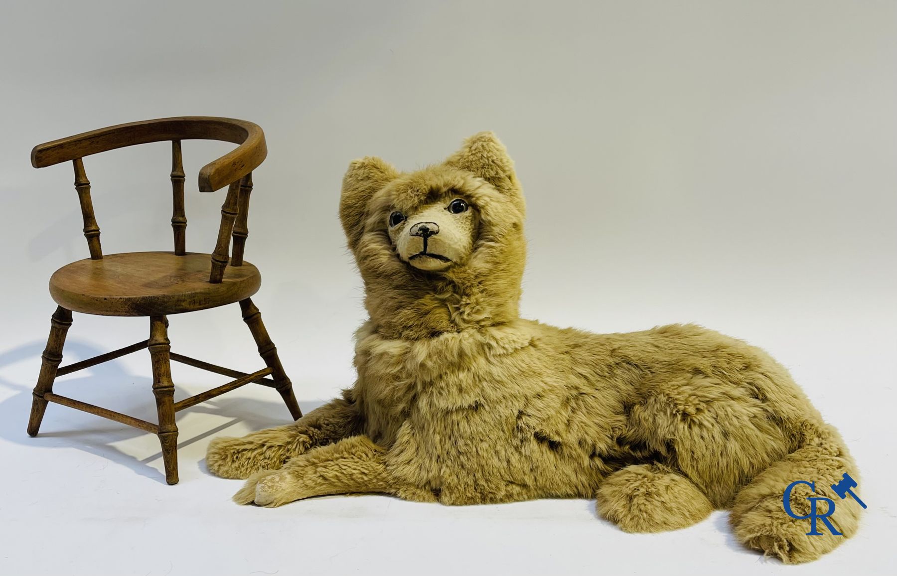 Toys: antique dolls. 3 dolls with porcelain head and a dog in fur.