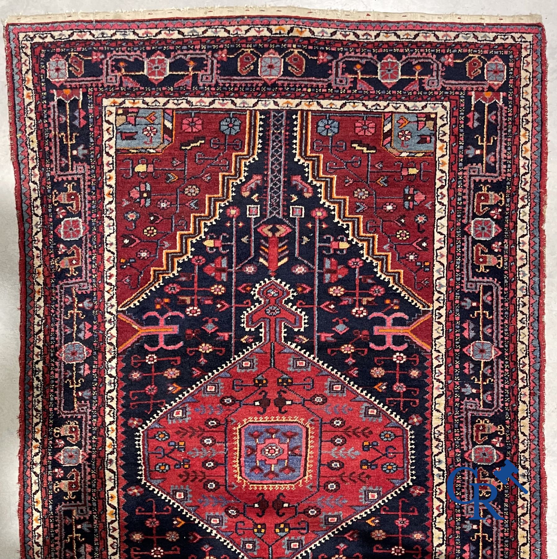 Oriental carpets: Oriental hand-knotted wool carpet.