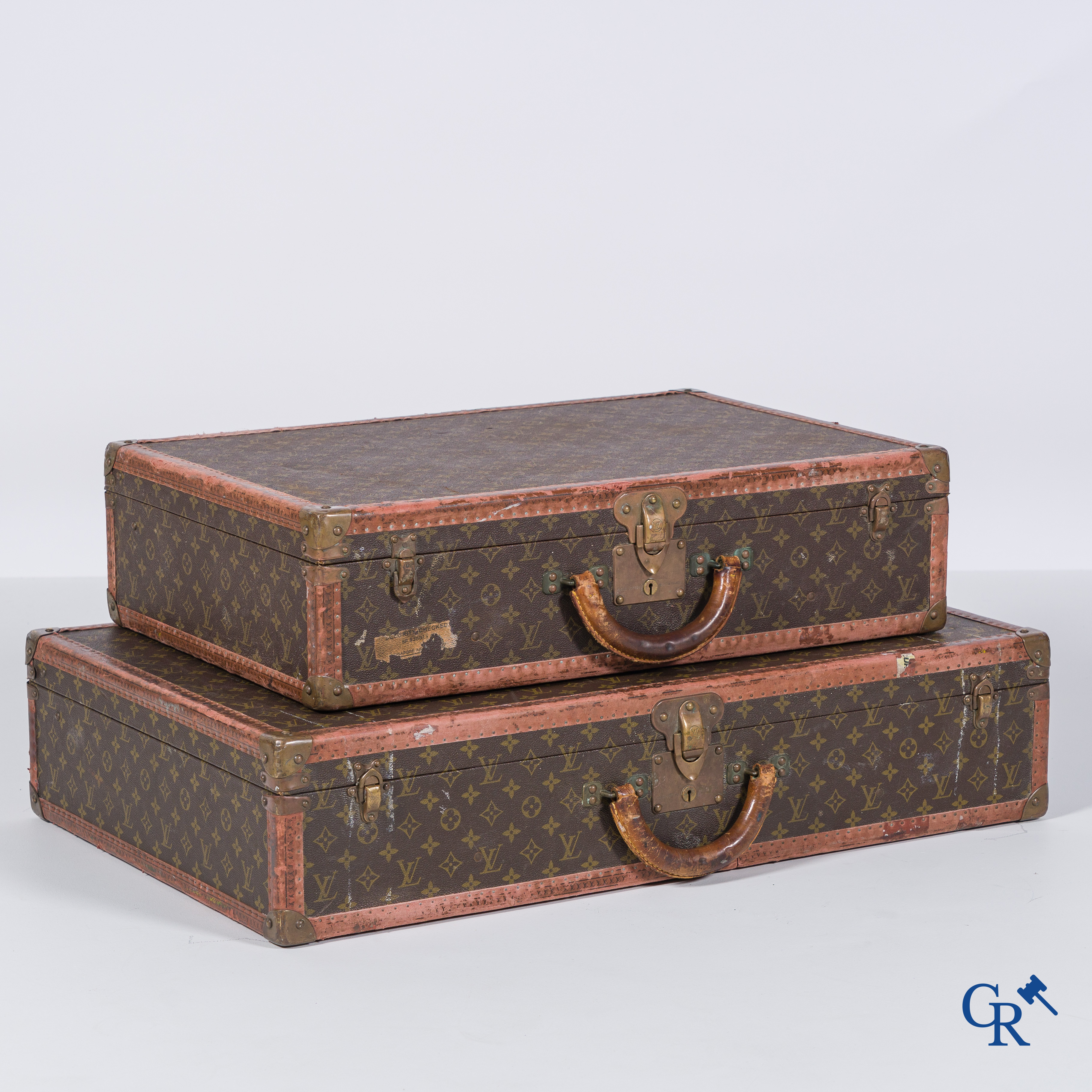 Louis Vuitton, 2 suitcases of which 1 with a label Av. Marceau 78 bis Paris and numbered 982010.