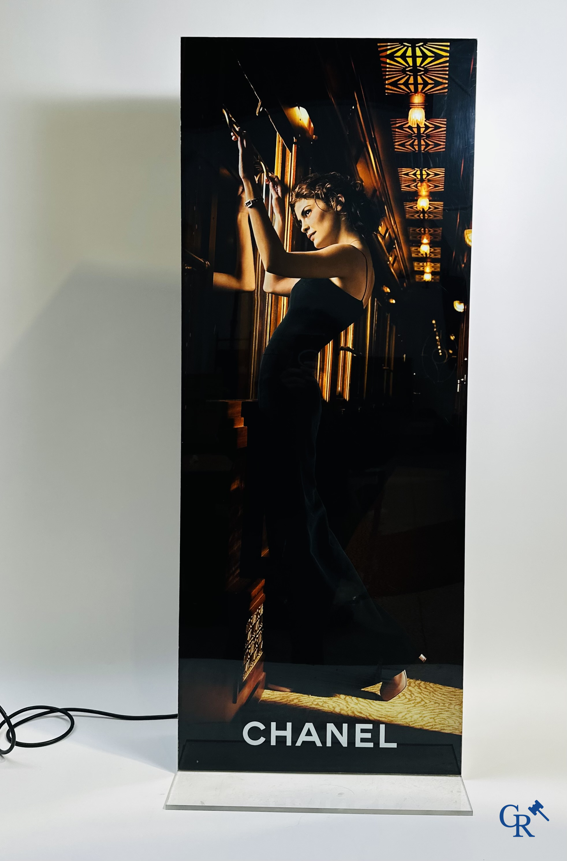 Chanel: Light advertising in plexiglass for Chanel N°5 with an image of the French actress Audrey Tautou.