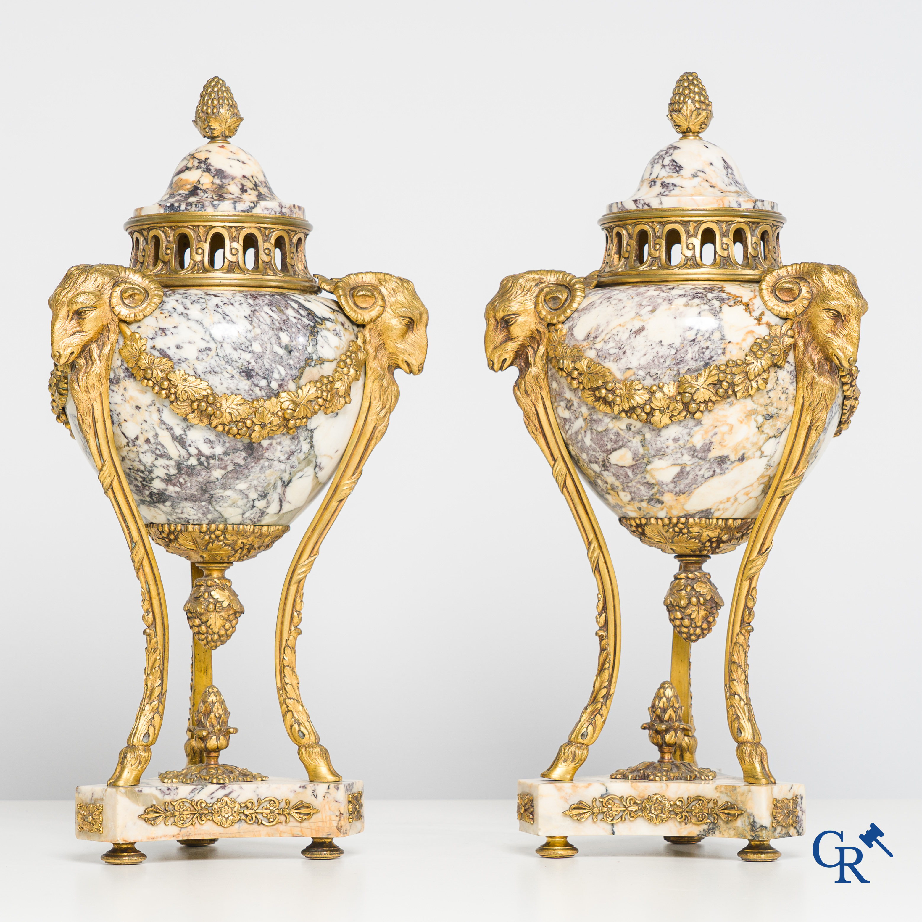 Pair of cassolettes in marble brèche violette with finely decorated and gilded bronze frames. Louis XVI style. 