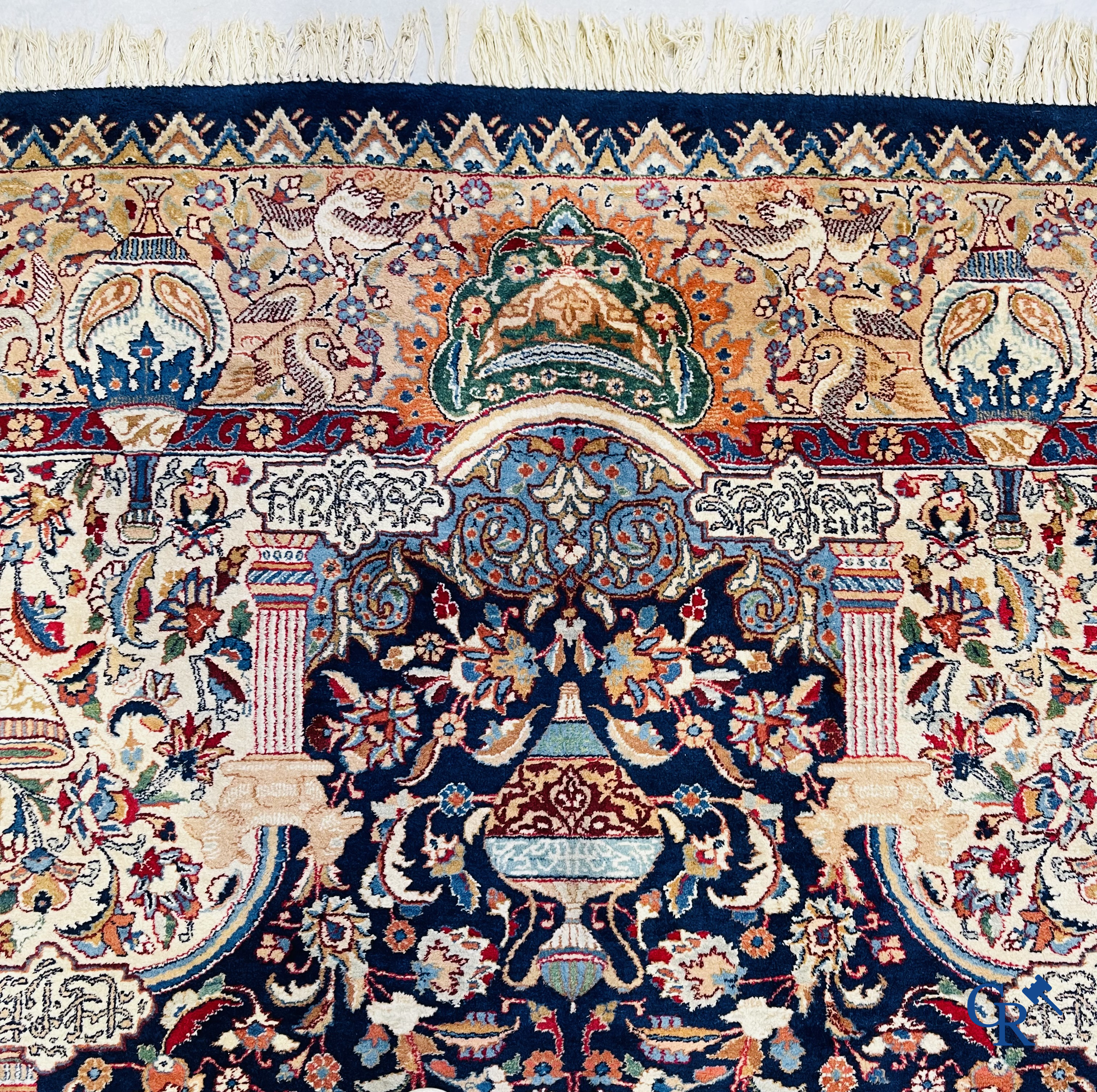 Oriental carpets: A large hand-knotted oriental carpet with antique decor. Multiple inscriptions.