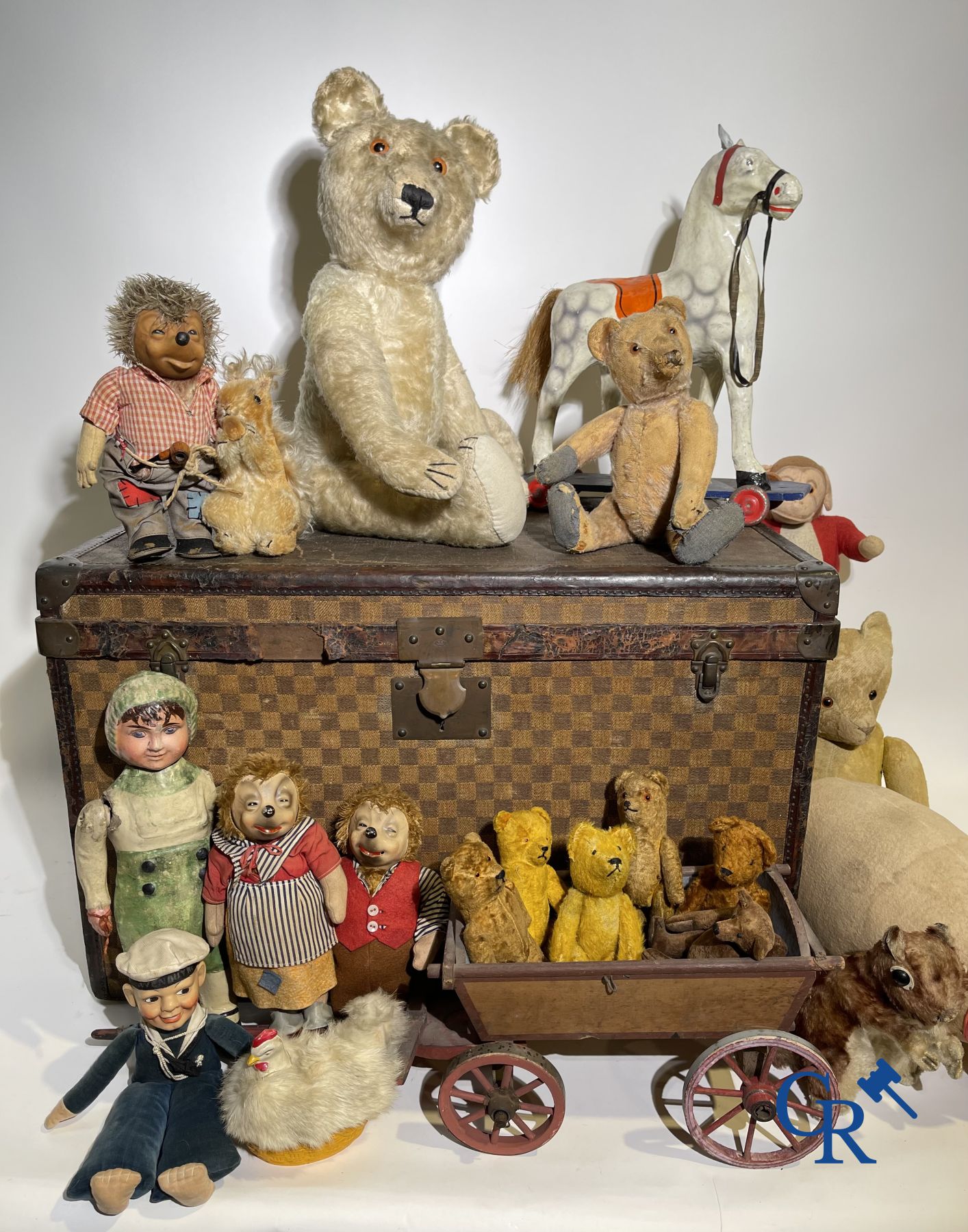 Toys: Travel suitcase filled with toys, an antique stroller and others.