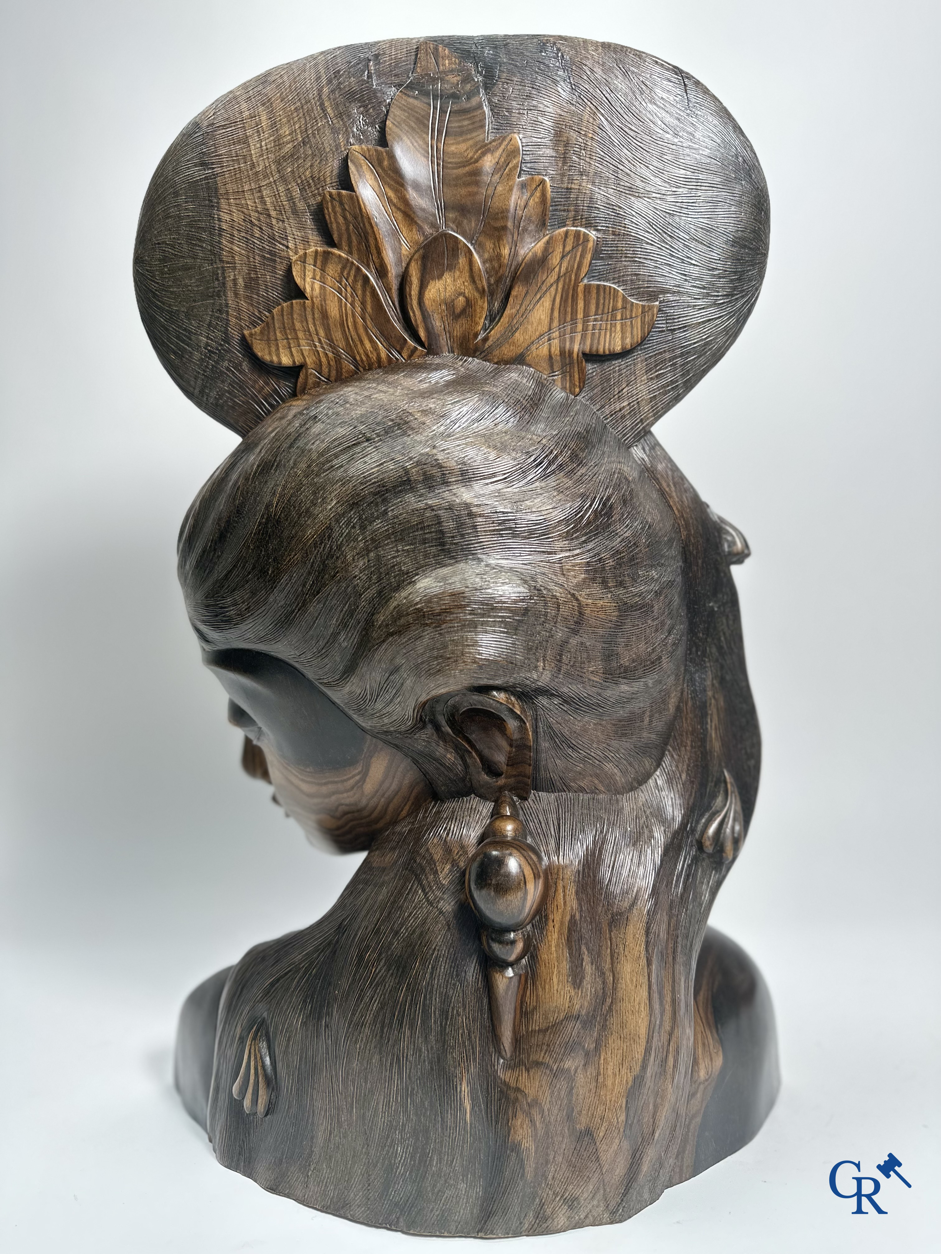 Indonesia: Imposing sculpture in exotic hardwood from a Javanese beauty.