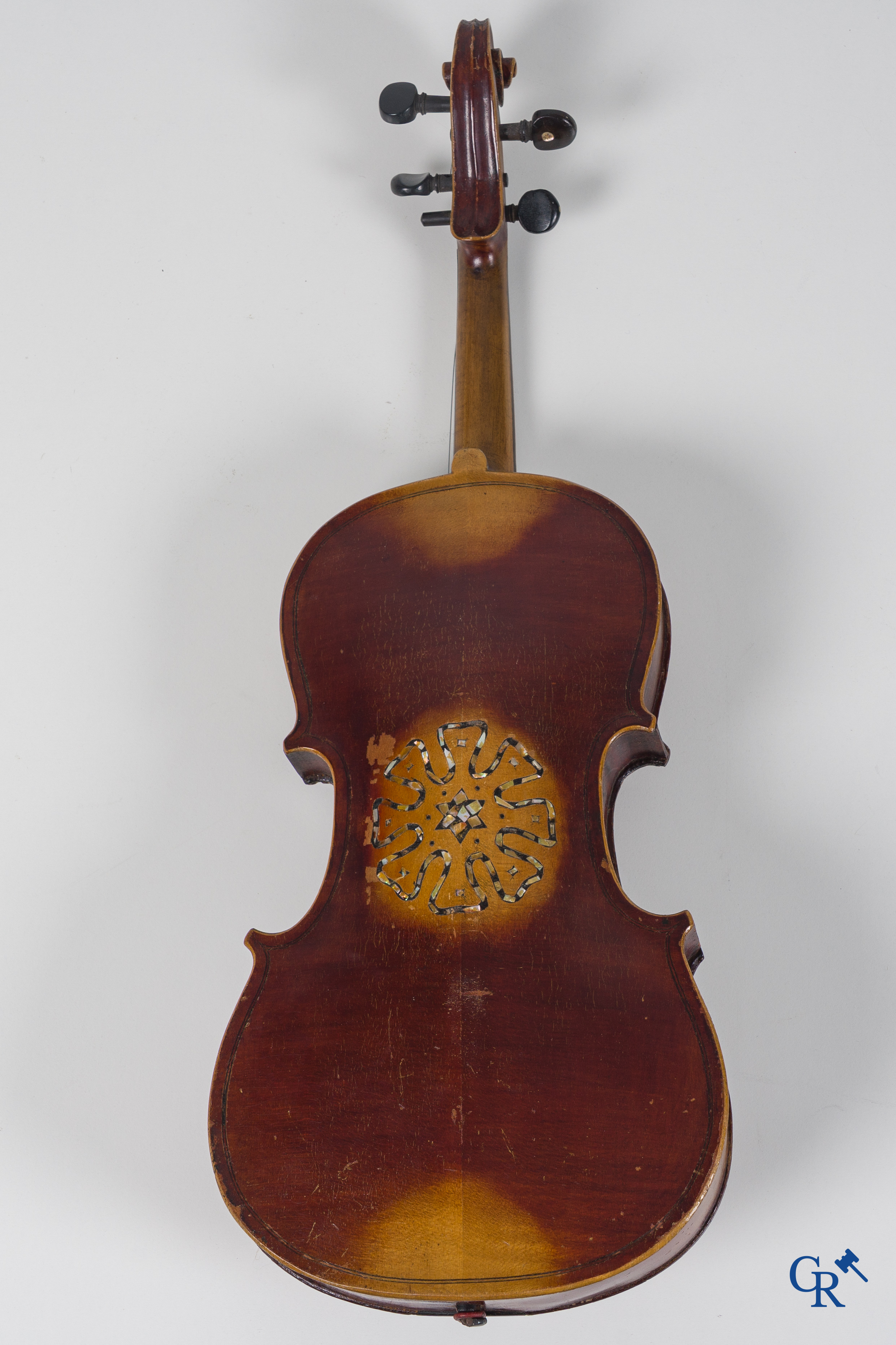 Musical instrument: Violin decorated with mother-of-pearl.