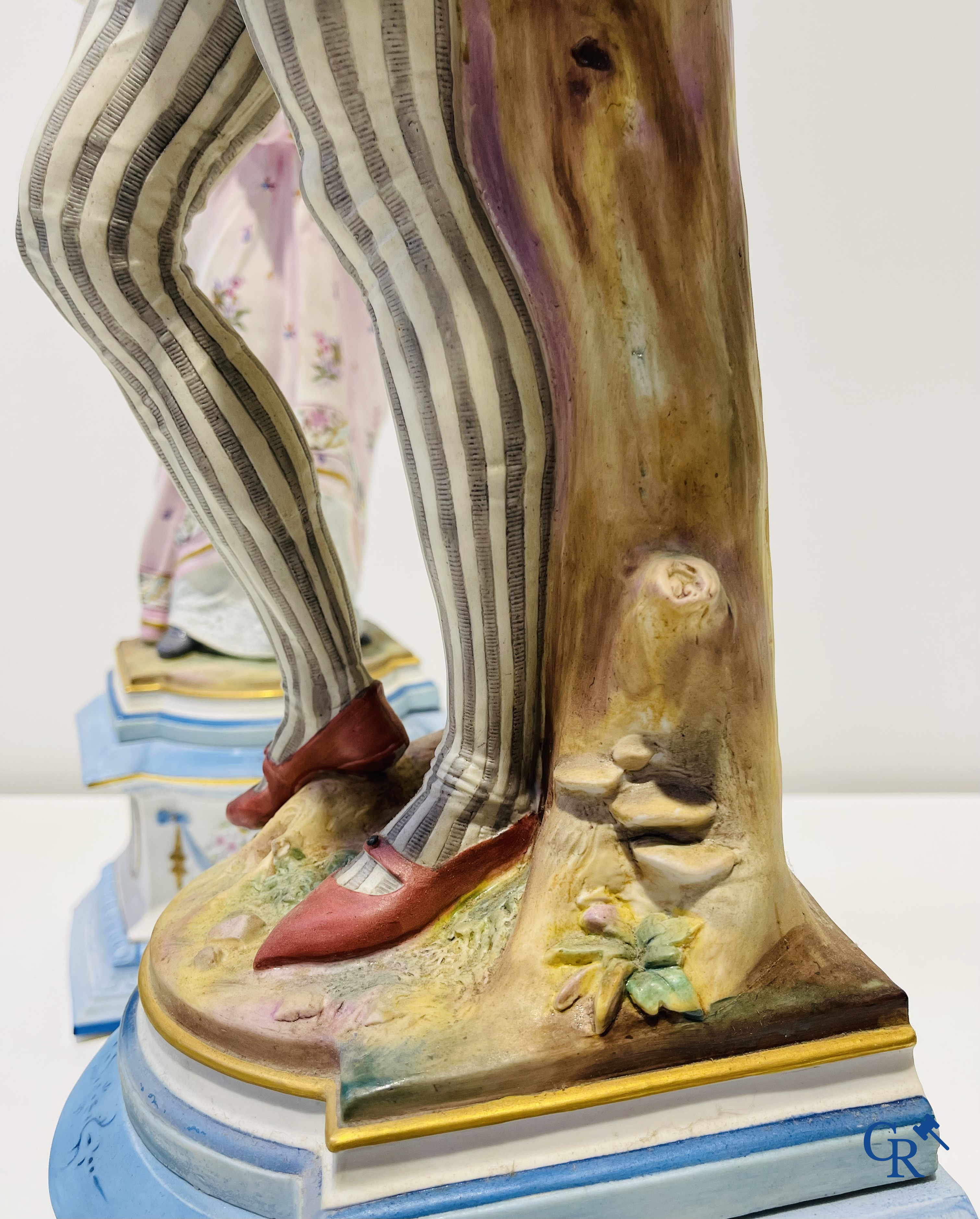 Exceptional pair of large statues in coloured and gilded biscuit porcelain. 2nd half of the 19th century.