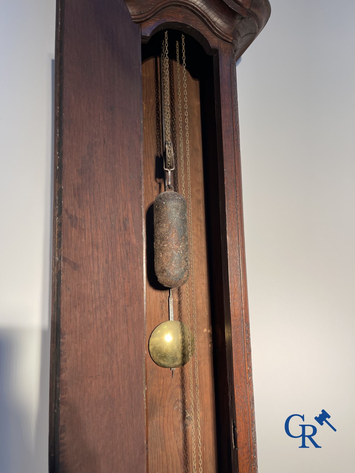 Standing clock in oak. 18th century.