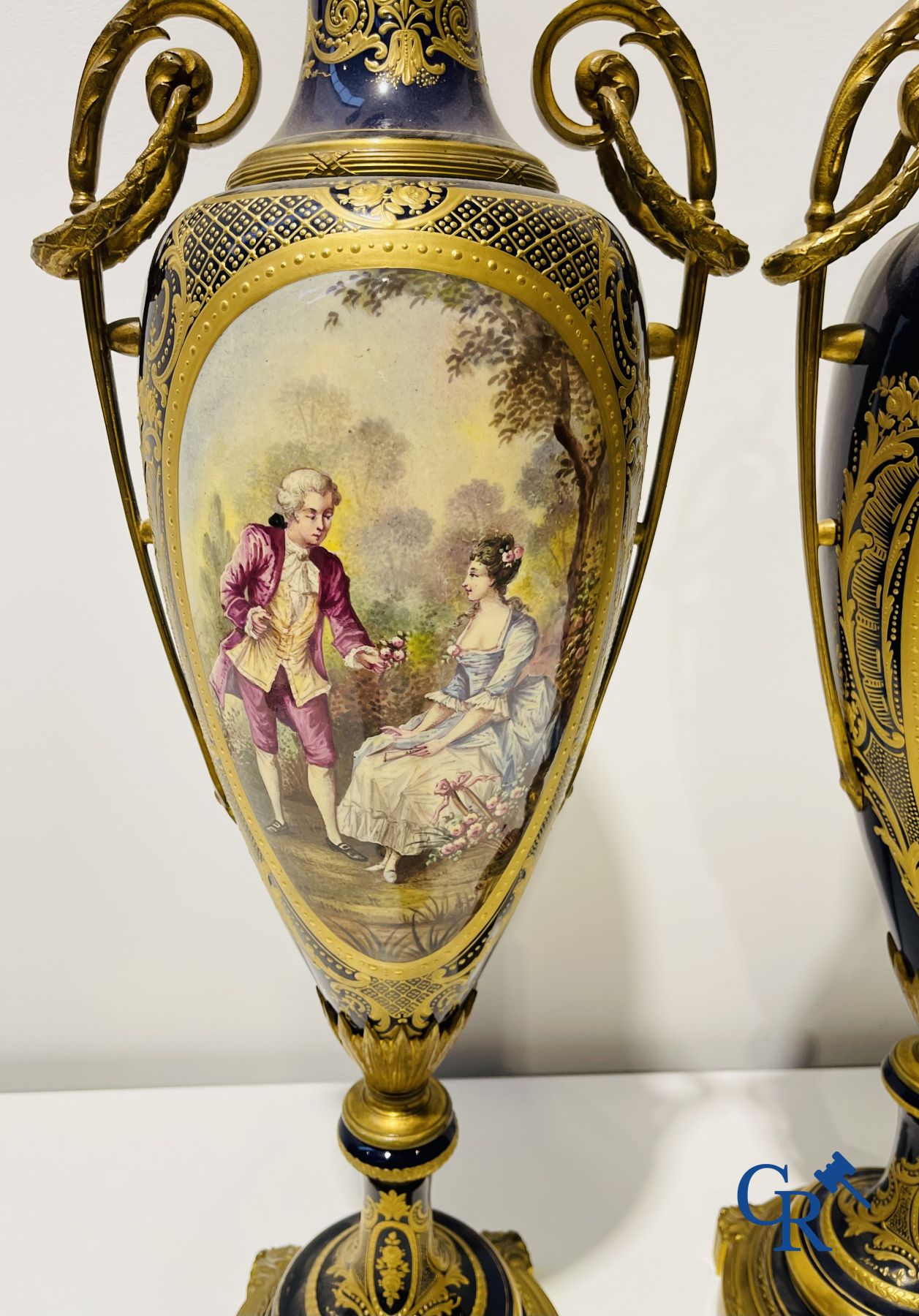 Sèvres: Poitevin. Pair of large vases in faience and bronze frames with romantic scenes. LXVI style. 19th-20th century.