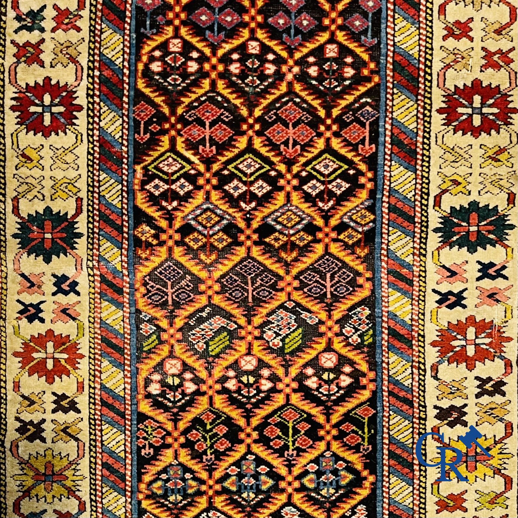 Oriental carpets: An antique oriental runner.