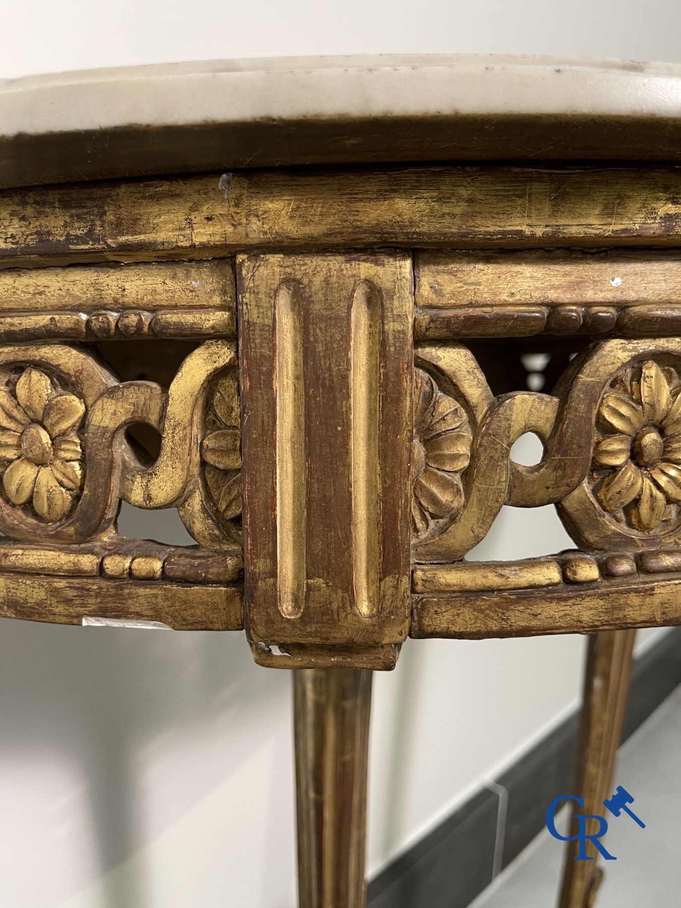 Furniture: Wood sculpted and gilded crescent shaped console. LXVI-period.