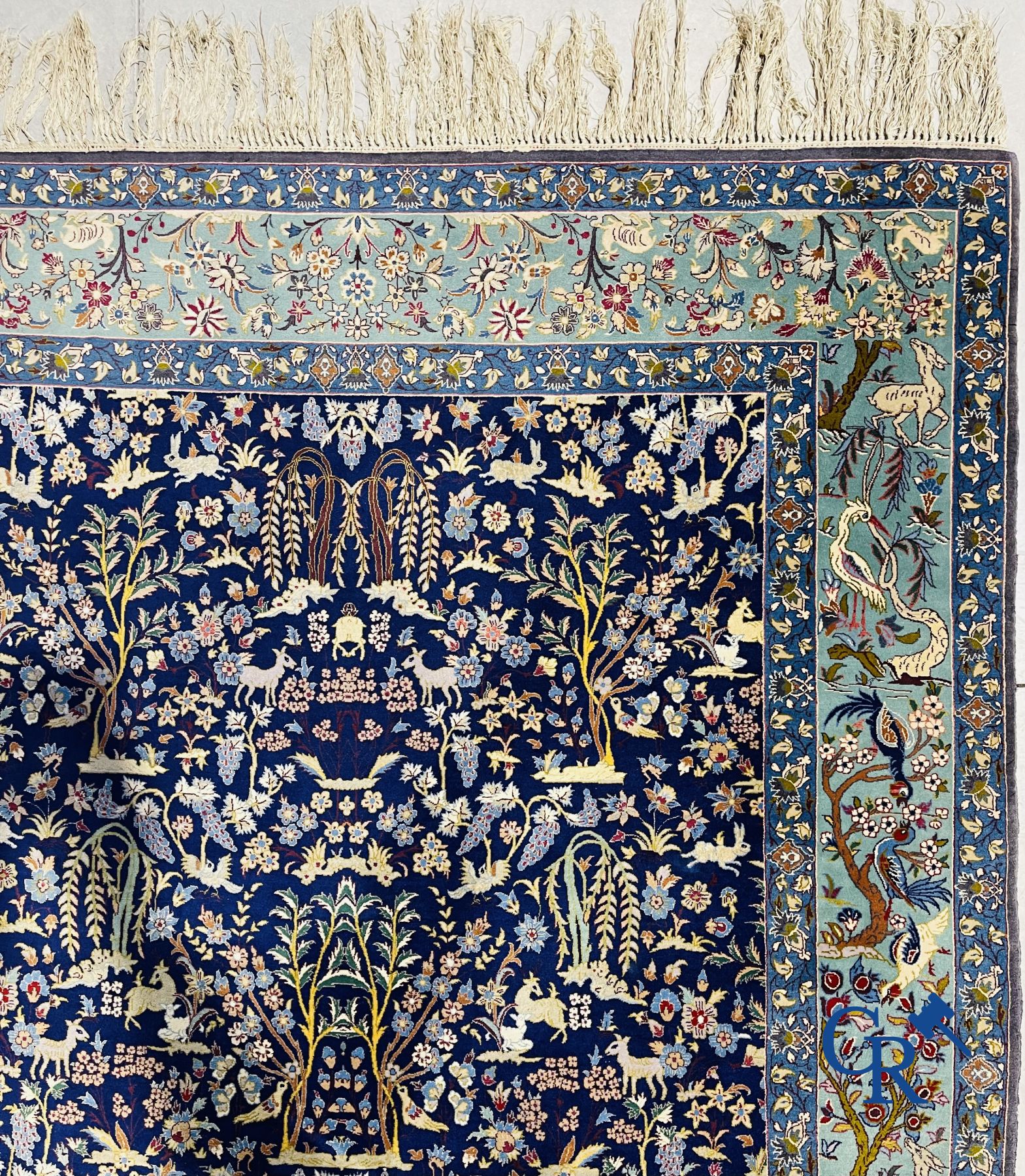 Oriental carpets: Iran. Isfahan, Persian hand-knotted carpet with a decor of animals, birds, plants and flowers.