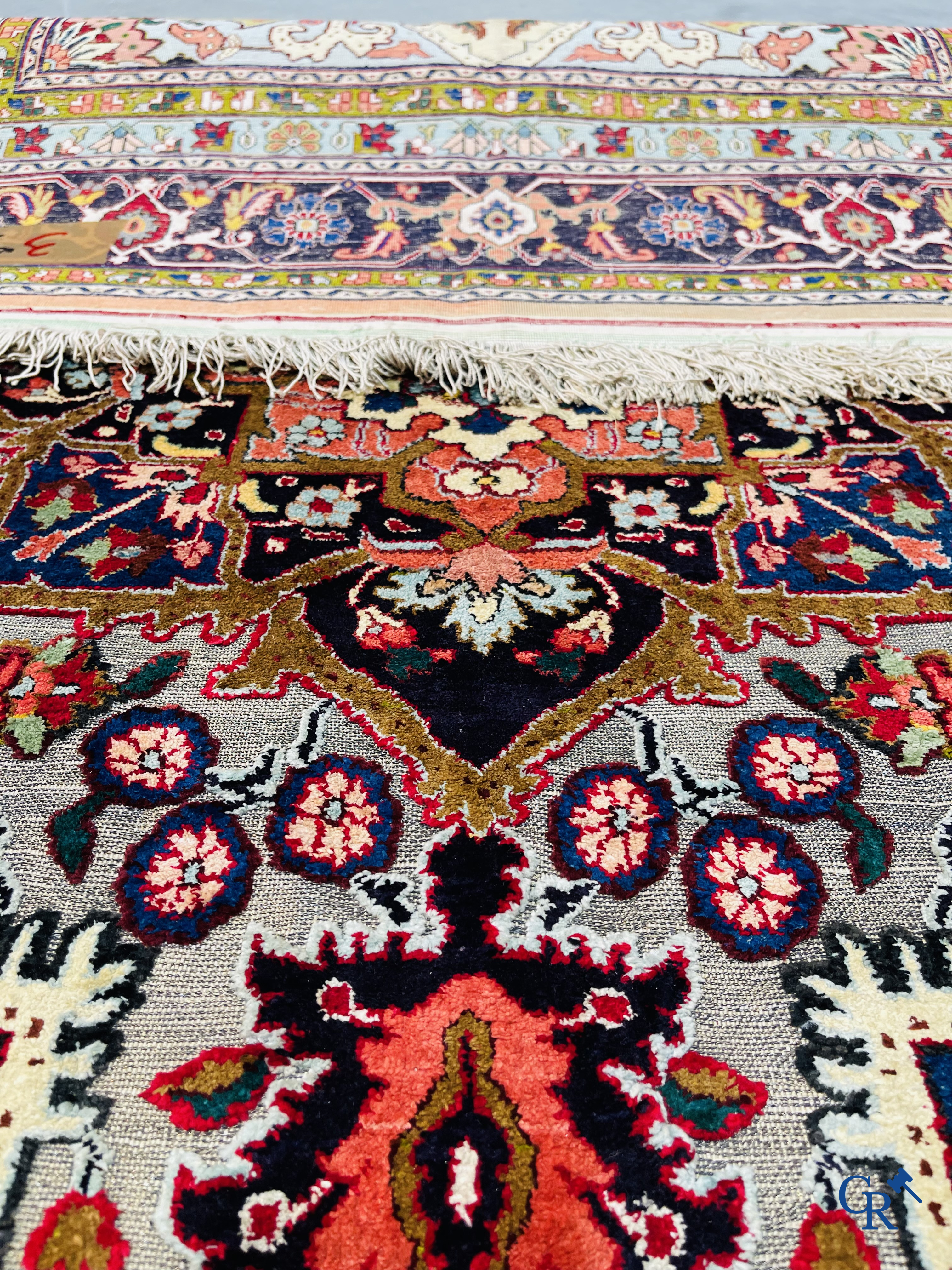 Oriental carpets: Heriz, an exceptionally finely knotted carpet decorated with silver thread.