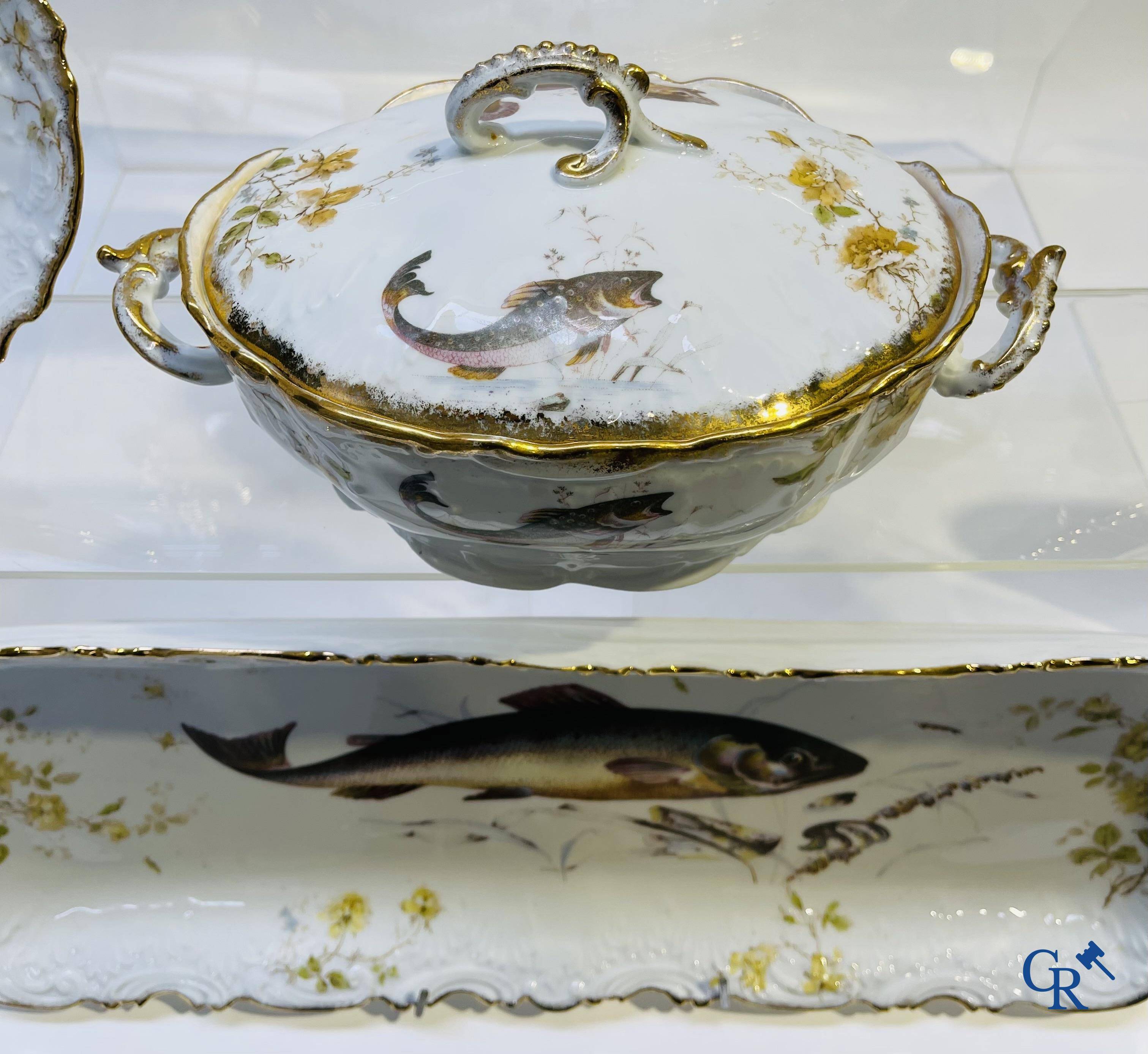 Extraordinary tableware in Brussels porcelain with a theme of freshwater fish.