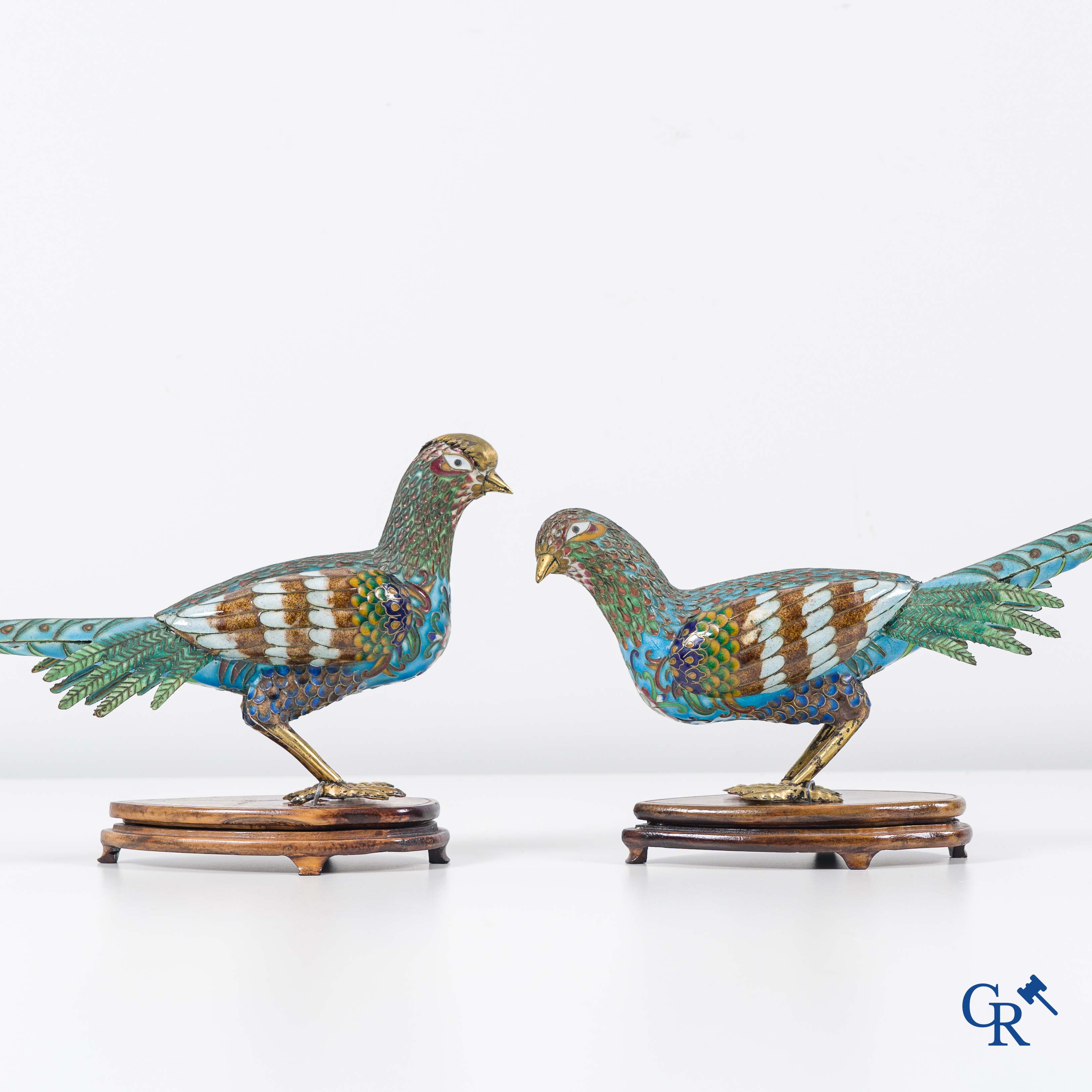 Asian Art: Chinese cloisonné. A pair of pheasants in finely crafted cloisonné. 20th century.