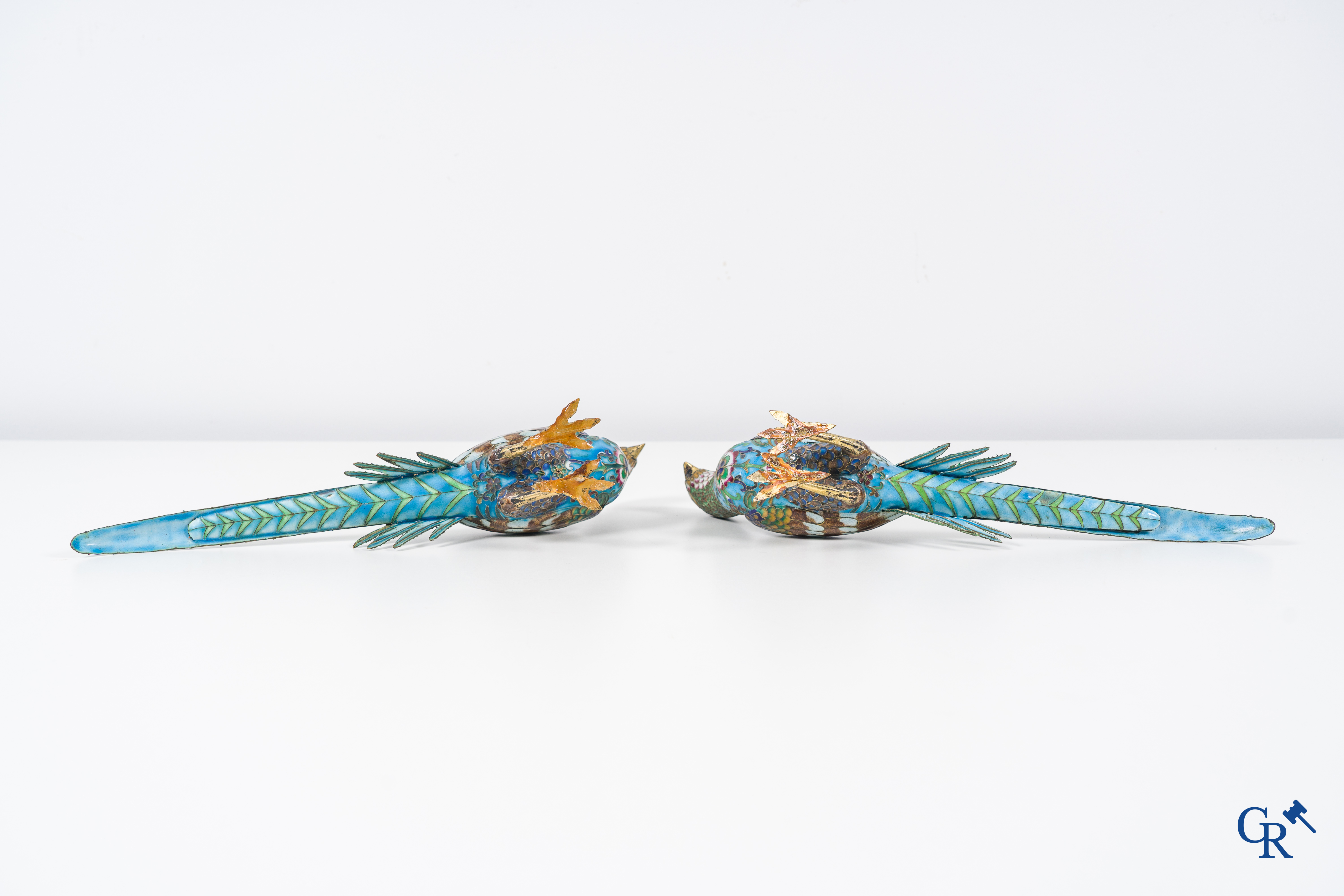 Asian Art: Chinese cloisonné. A pair of pheasants in finely crafted cloisonné. 20th century.