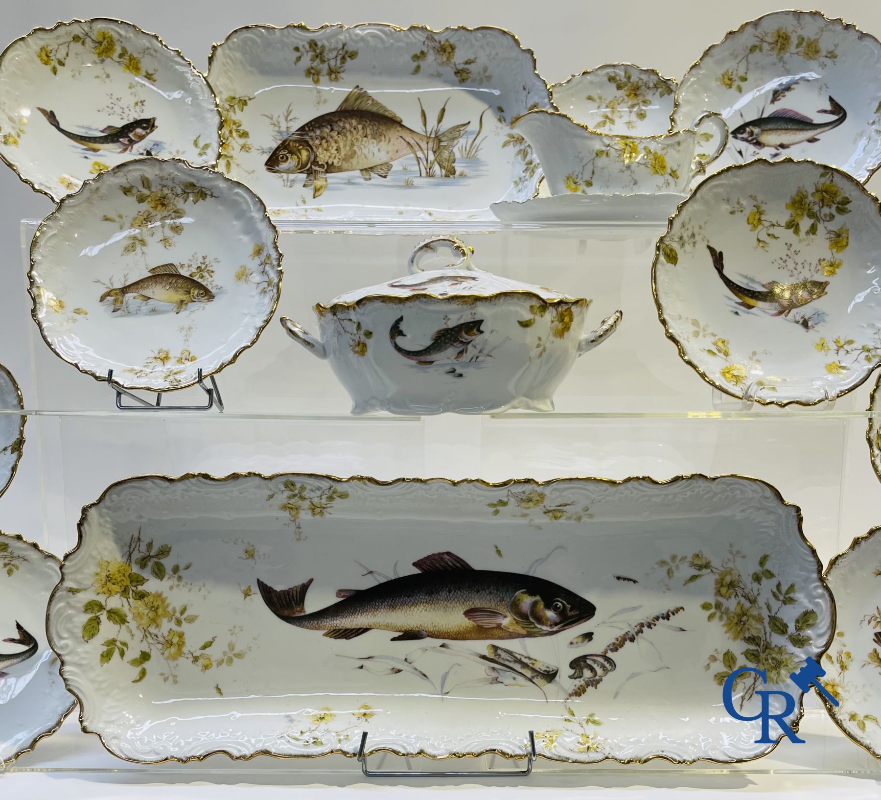 Extraordinary tableware in Brussels porcelain with a theme of freshwater fish.