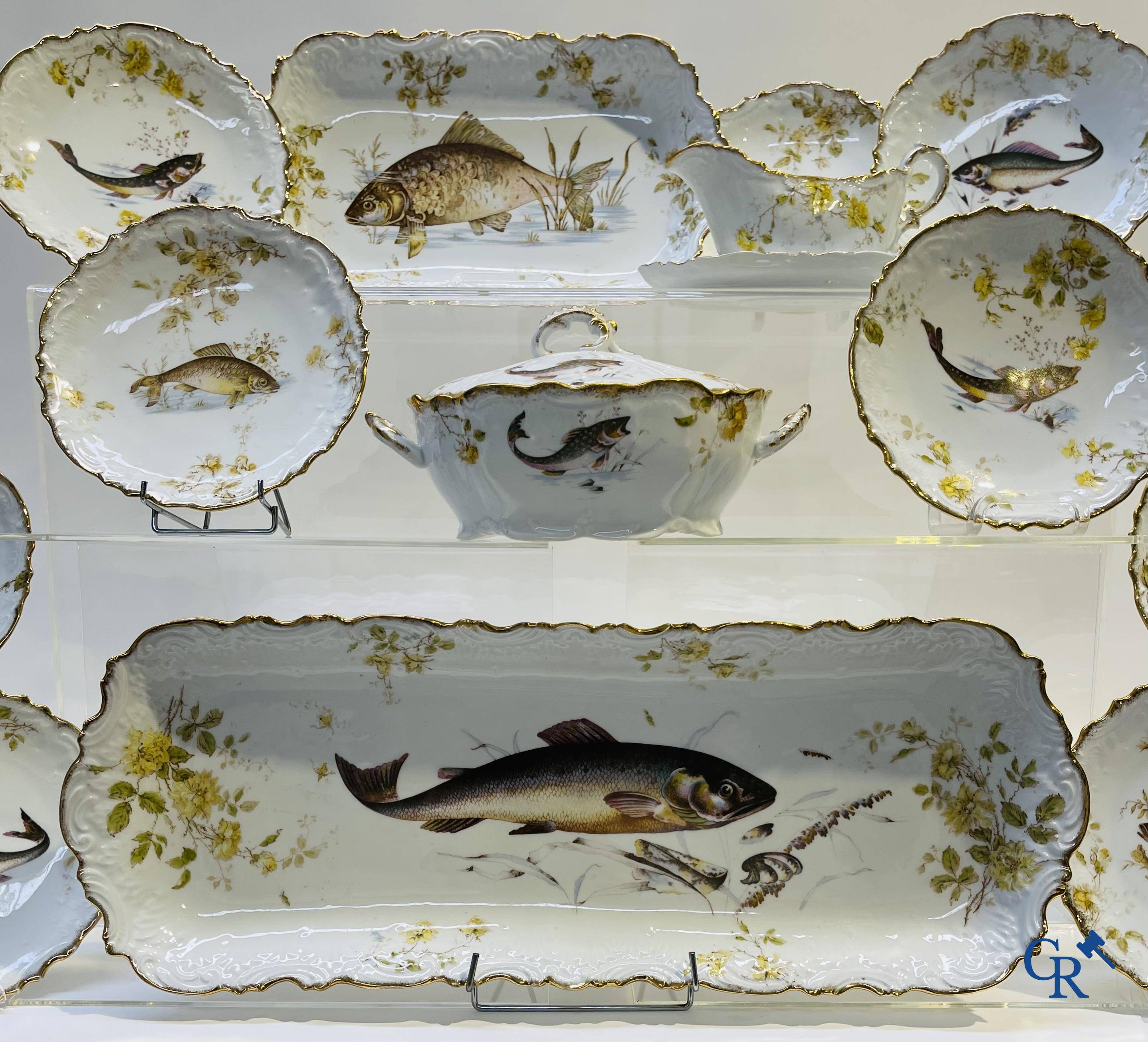 Extraordinary tableware in Brussels porcelain with a theme of freshwater fish.