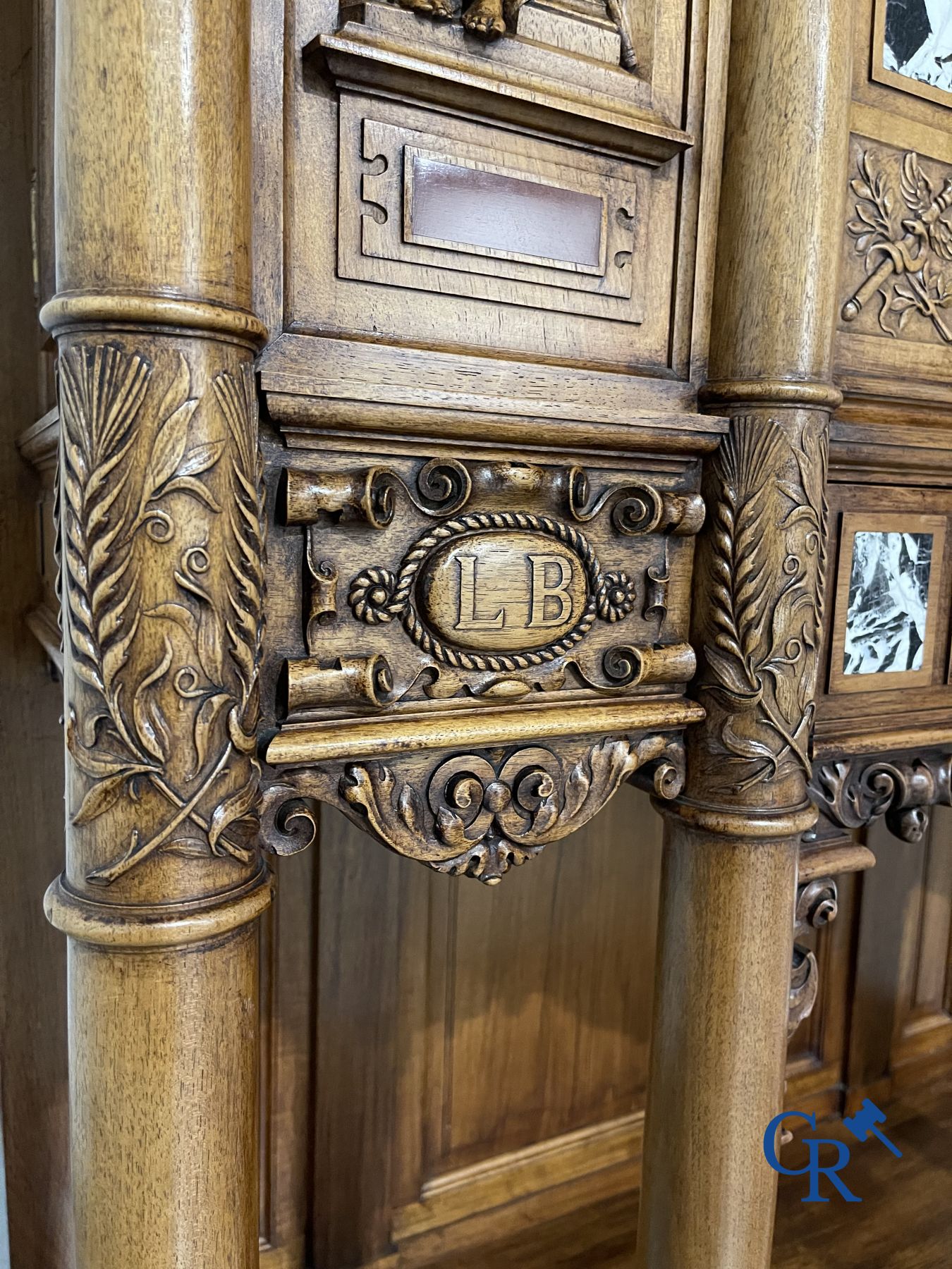 Furniture: A finely carved walnut credence in neo renaissance style with marble inlay.