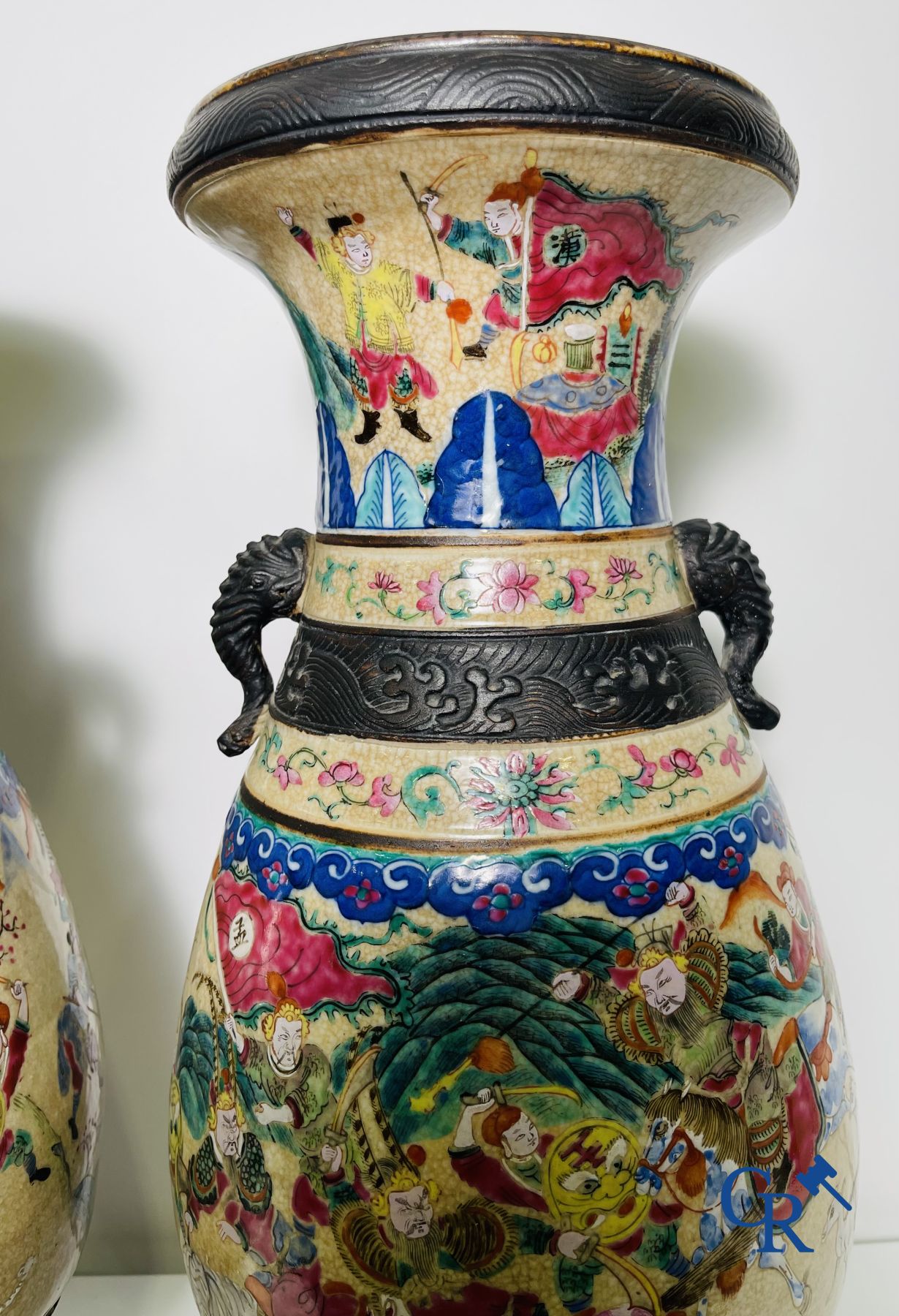 Asian Art: A pair of Chinese Nanking vases with famille rose decor.