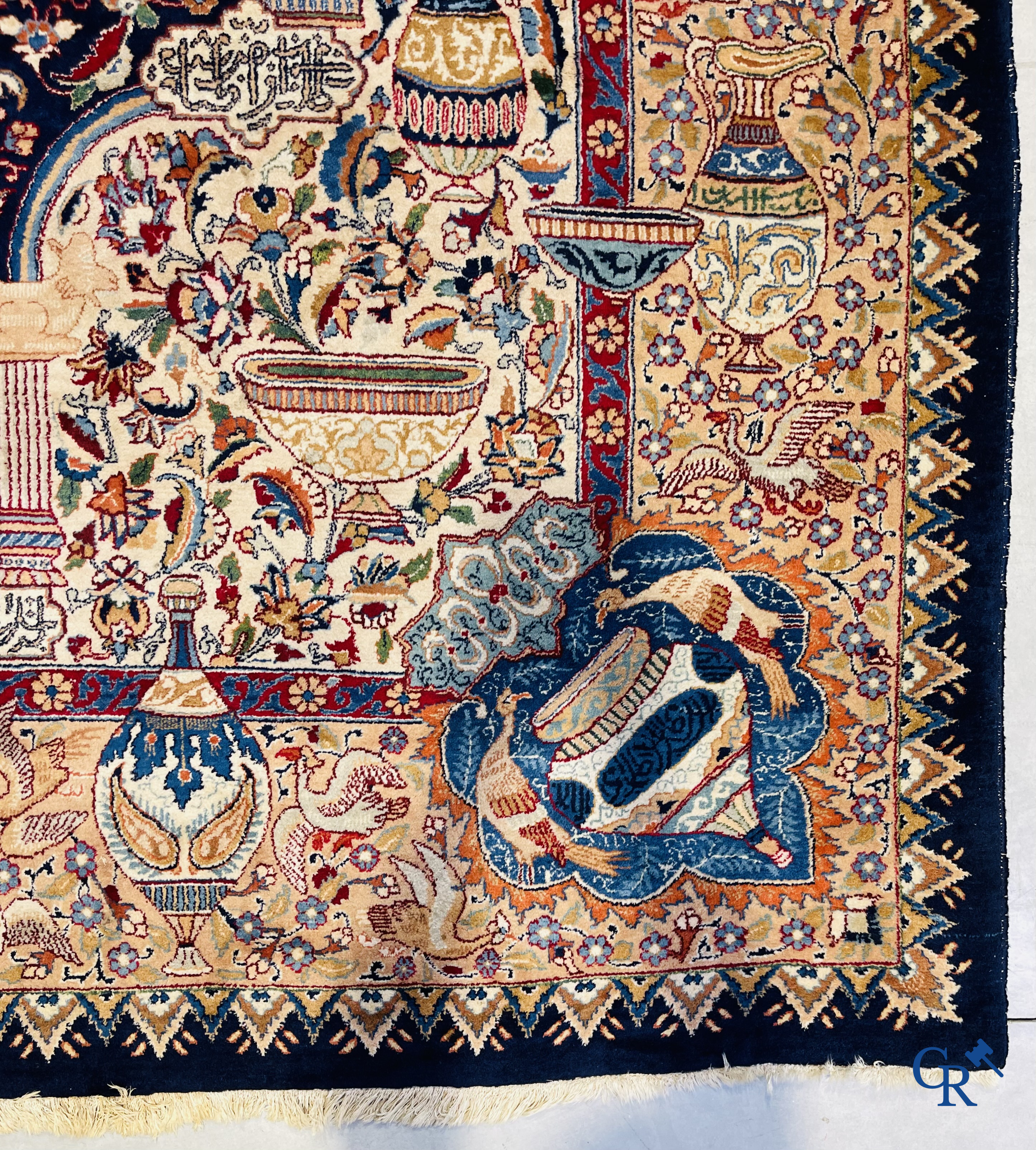 Oriental carpets: A large hand-knotted oriental carpet with antique decor. Multiple inscriptions.