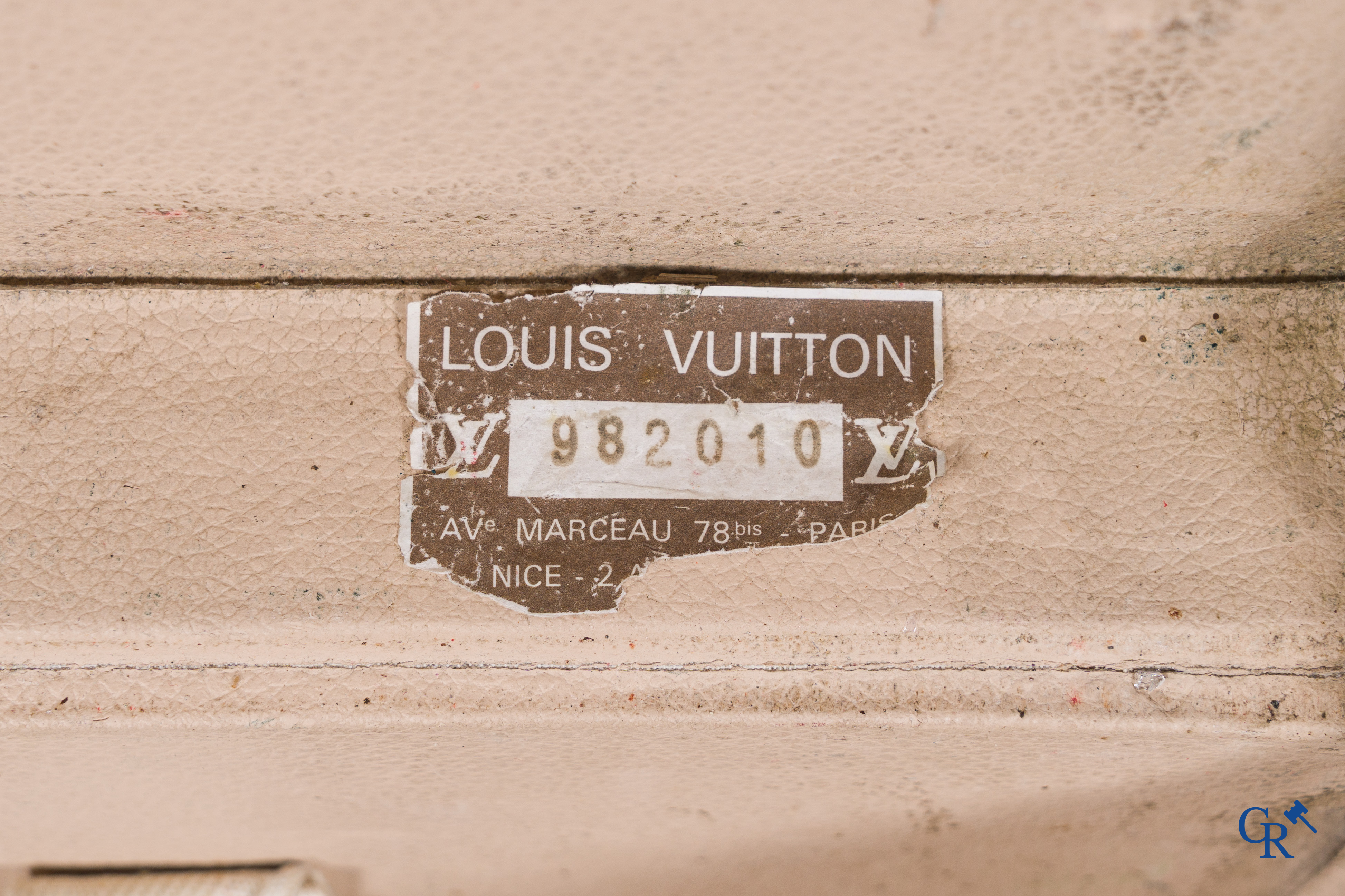 Louis Vuitton, 2 suitcases of which 1 with a label Av. Marceau 78 bis Paris and numbered 982010.