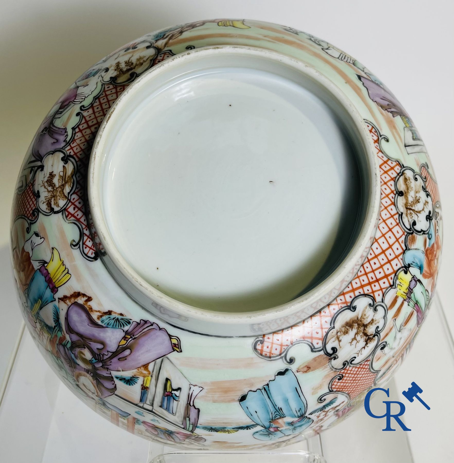 A large Chinese famille rose mandarin bowl, a famille rose cup and saucer and a figurine in blanc de chine.