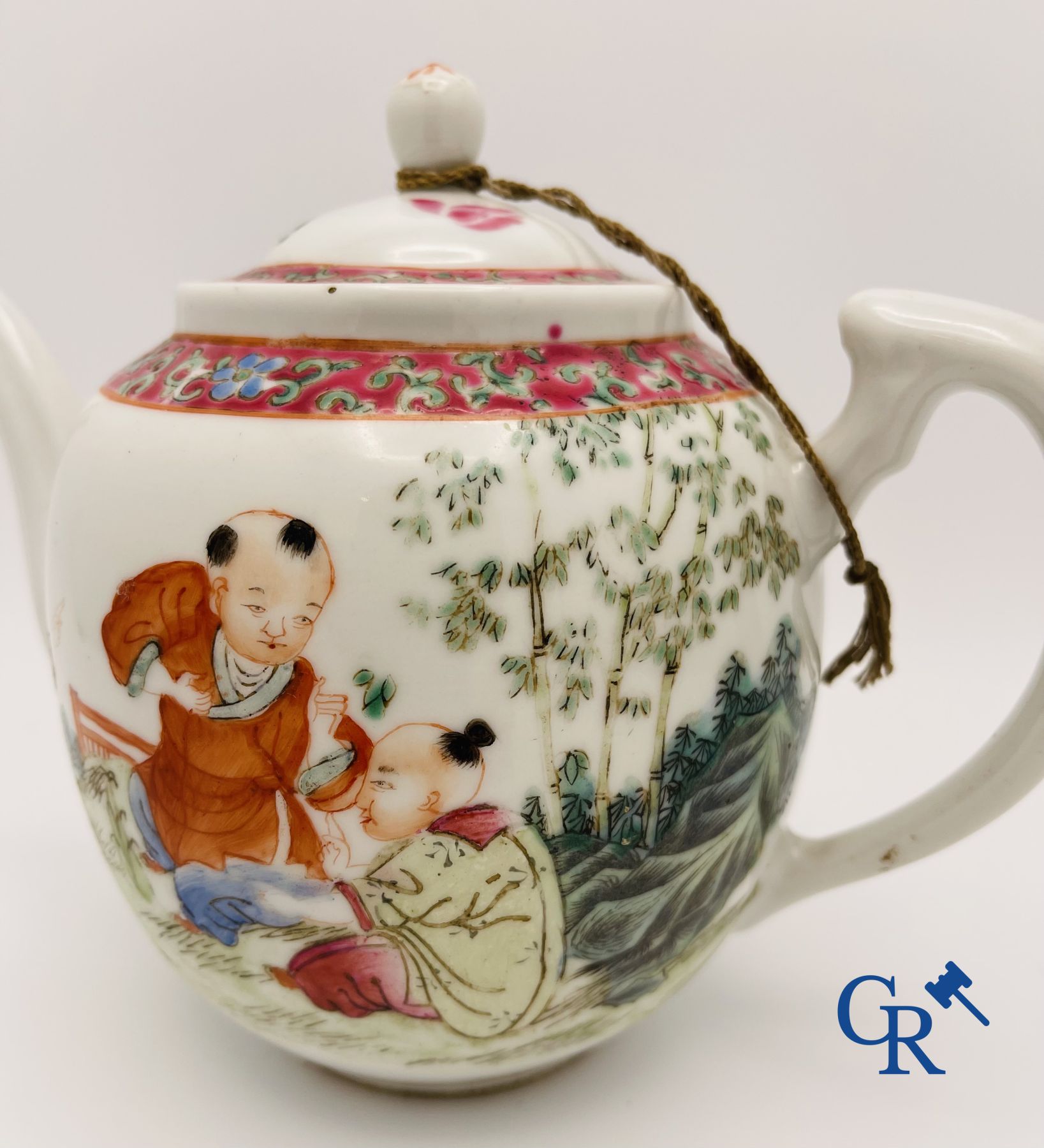 Asian Art: Chinese teapot in famille rose porcelain with a decor of  playing children.