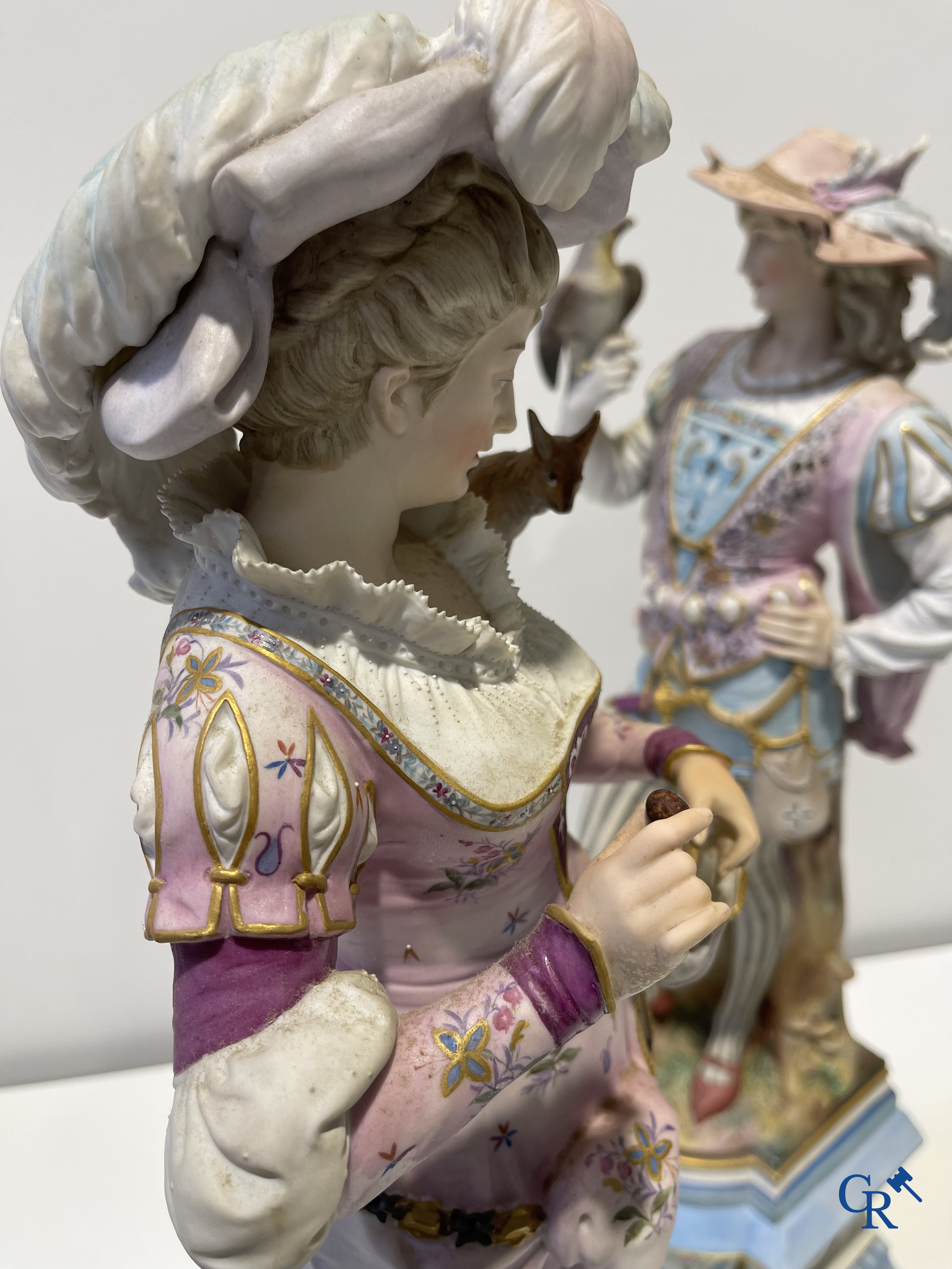 Exceptional pair of large statues in coloured and gilded biscuit porcelain. 2nd half of the 19th century.