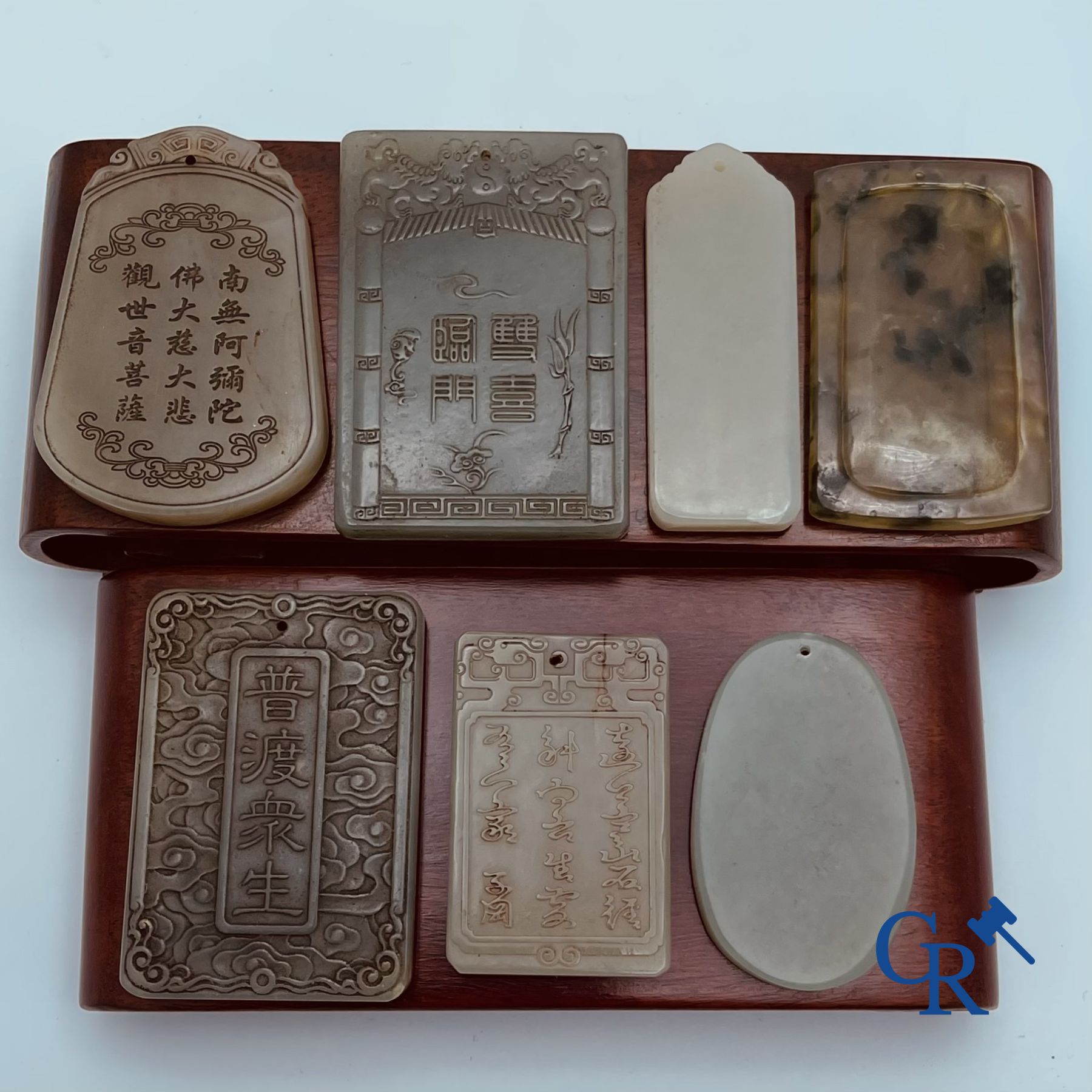 Asian art: 7 Chinese jade amulets. 19th-20th century.