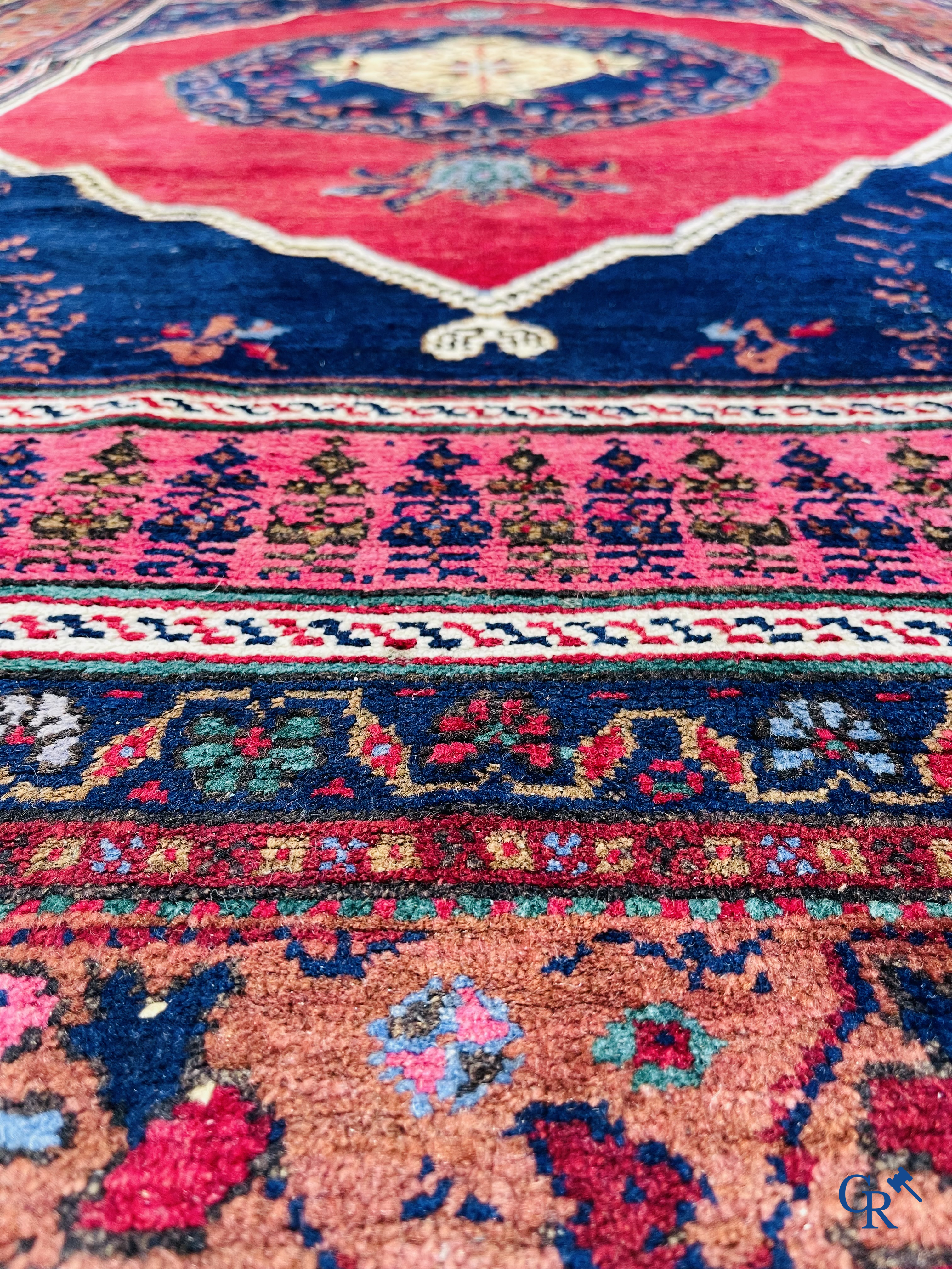 Oriental carpets, 2 antique hand-knotted Oriental carpets.