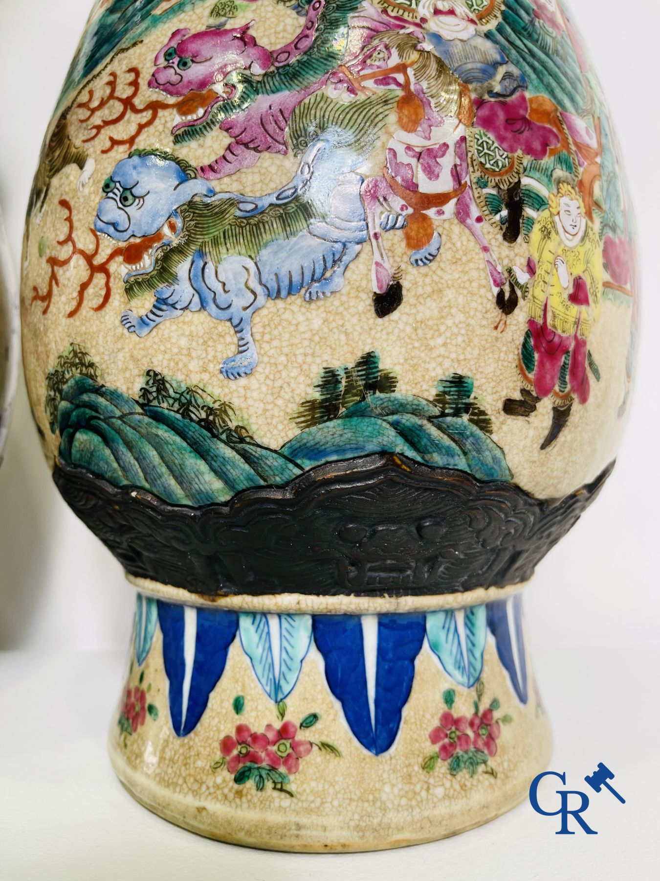 Asian Art: A pair of Chinese Nanking vases with famille rose decor.