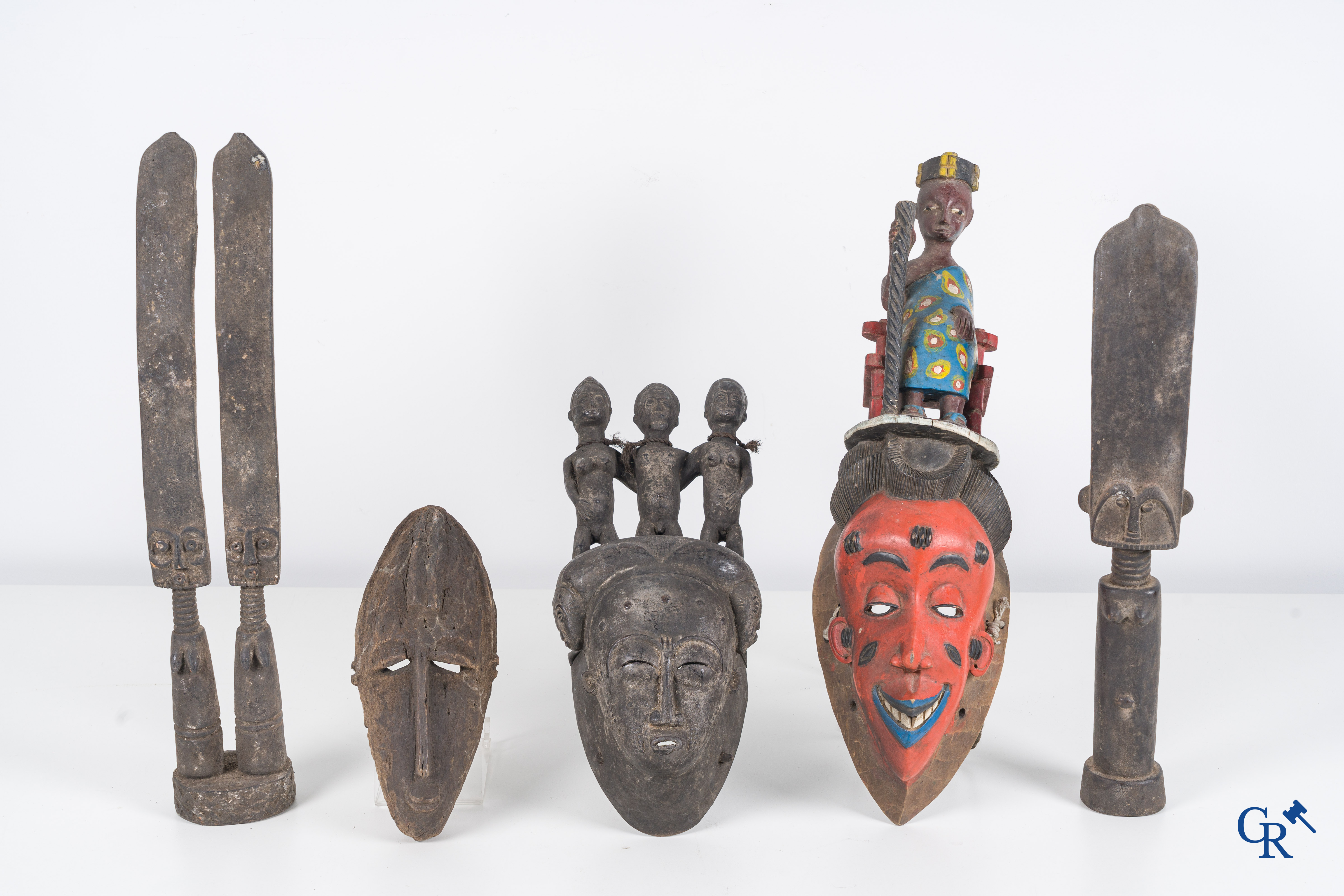 Tribal art, Primitive art. A lot with African objects, masks, bronze slave band, necklace and others.