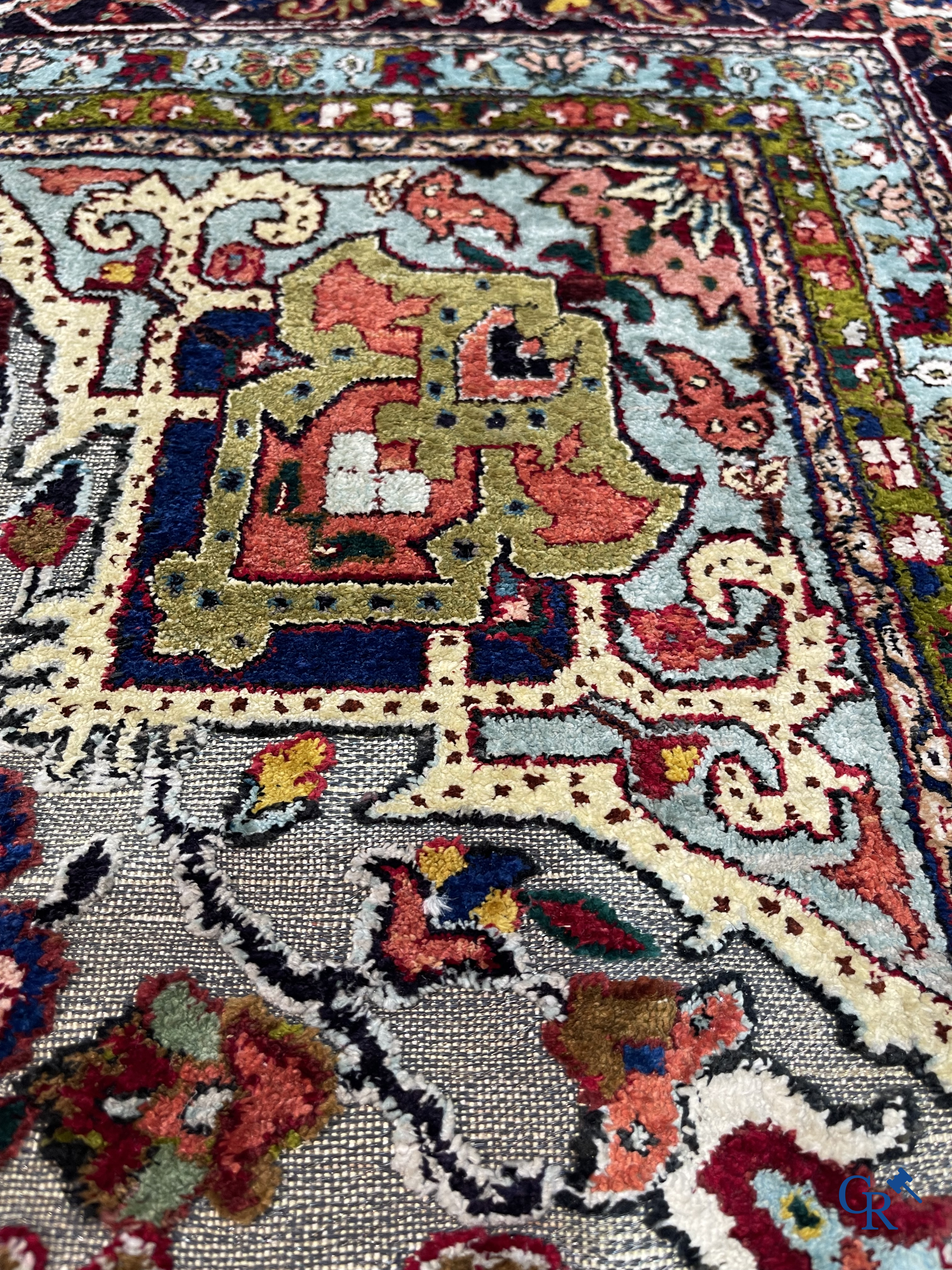 Oriental carpets: Heriz, an exceptionally finely knotted carpet decorated with silver thread.