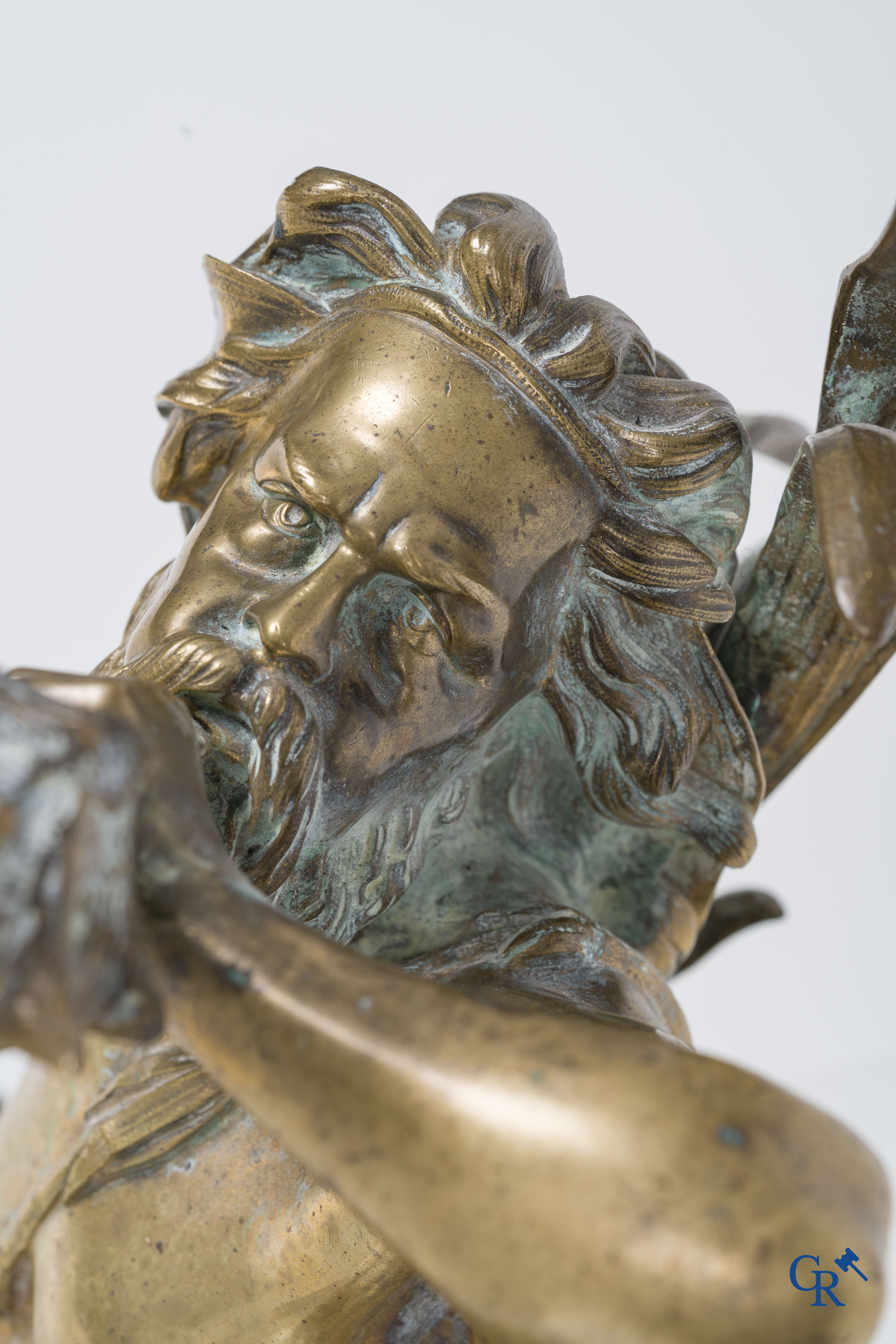 A large pair of finely chiseled bronze chenets with Tritons. Louis XV style. Napoleon III period.