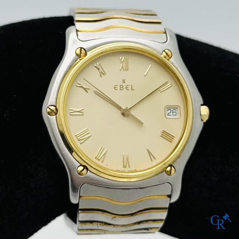 Ebel: Herenpolshorloge met armband in staal en bezel in goud 18K (750°00).