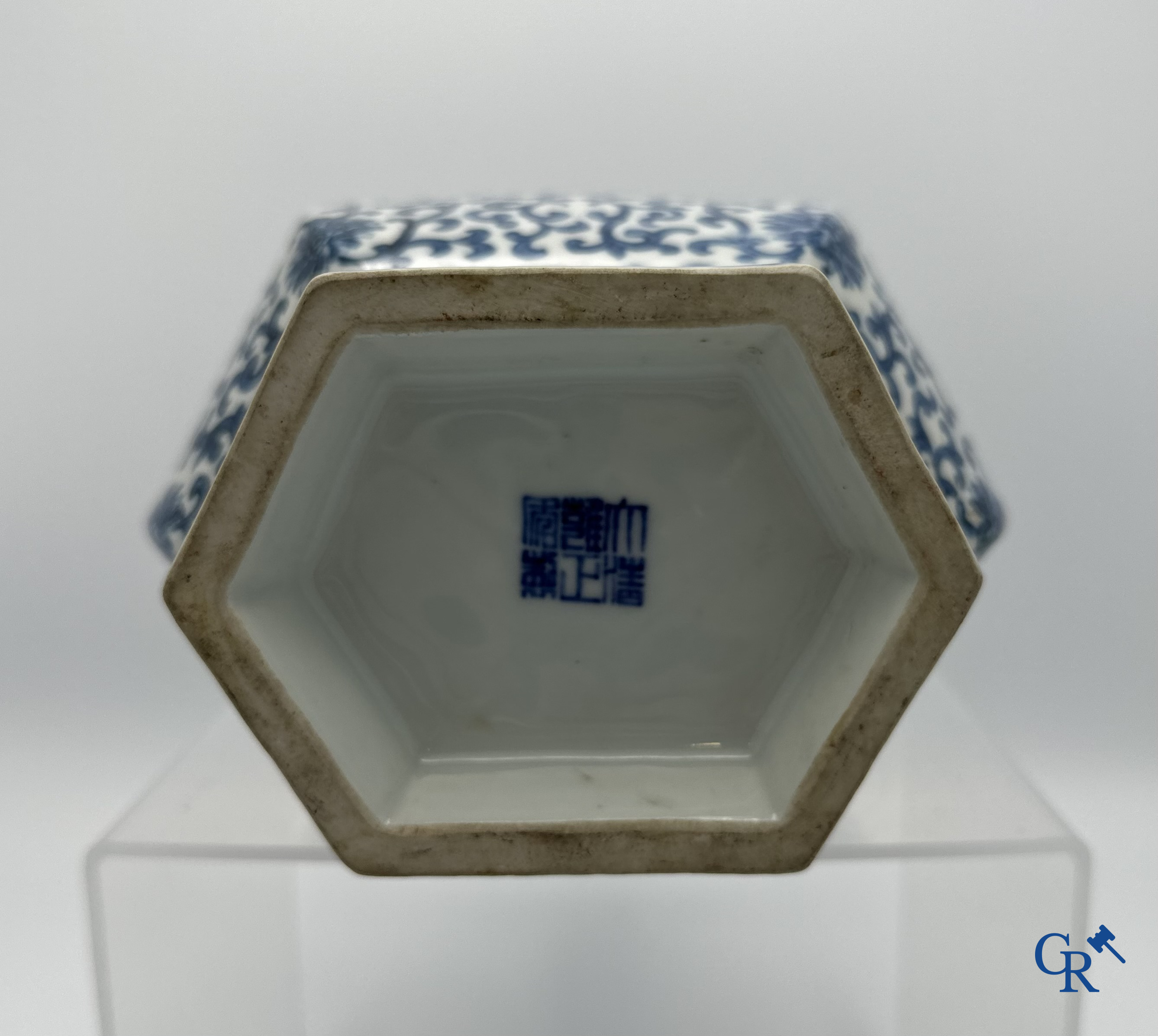 Chinese porcelain: Chinese blue and white vase with floral decor.