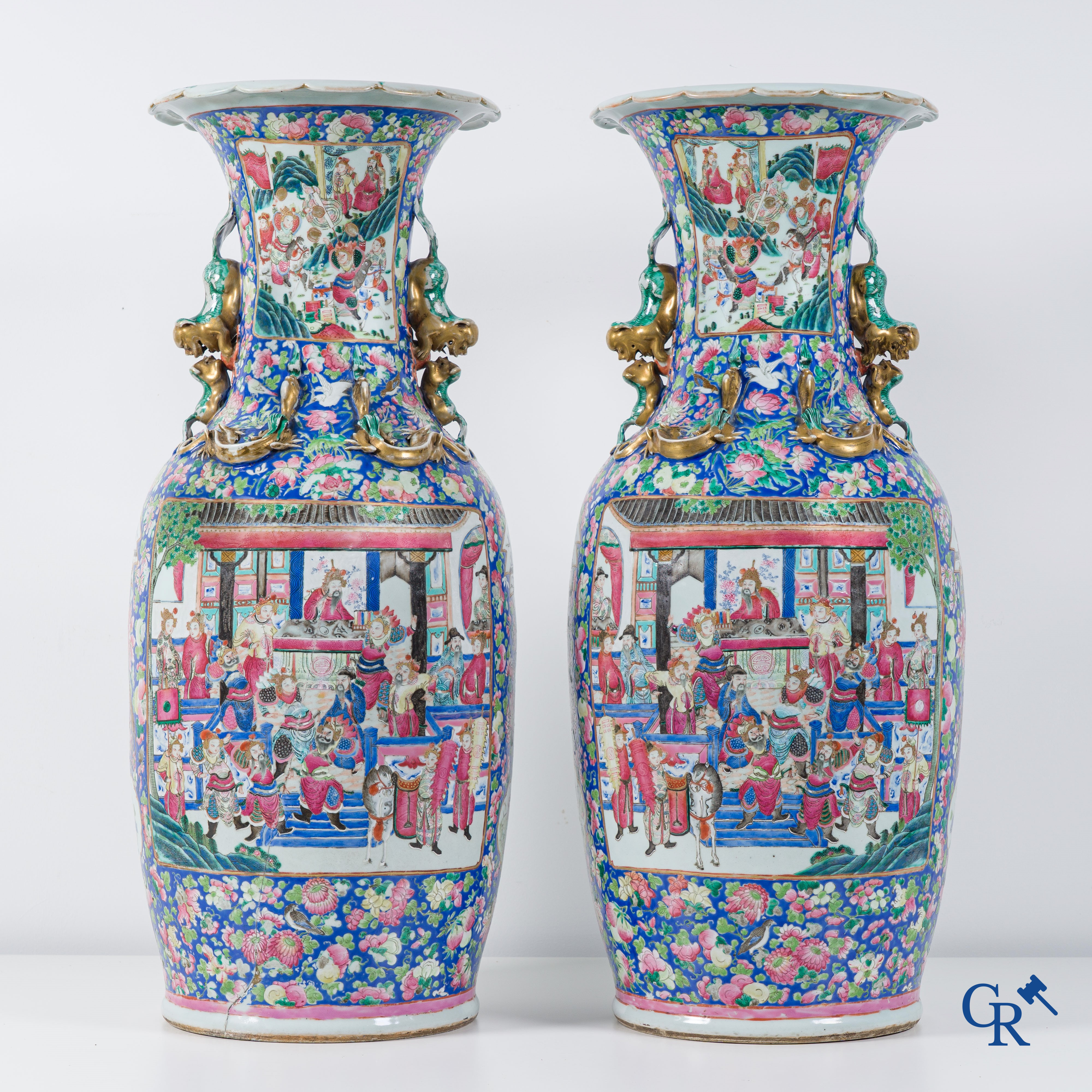 Asian Art: Chinese porcelain. A pair of imposing Chinese vases with famille rose decor. China 19th century.