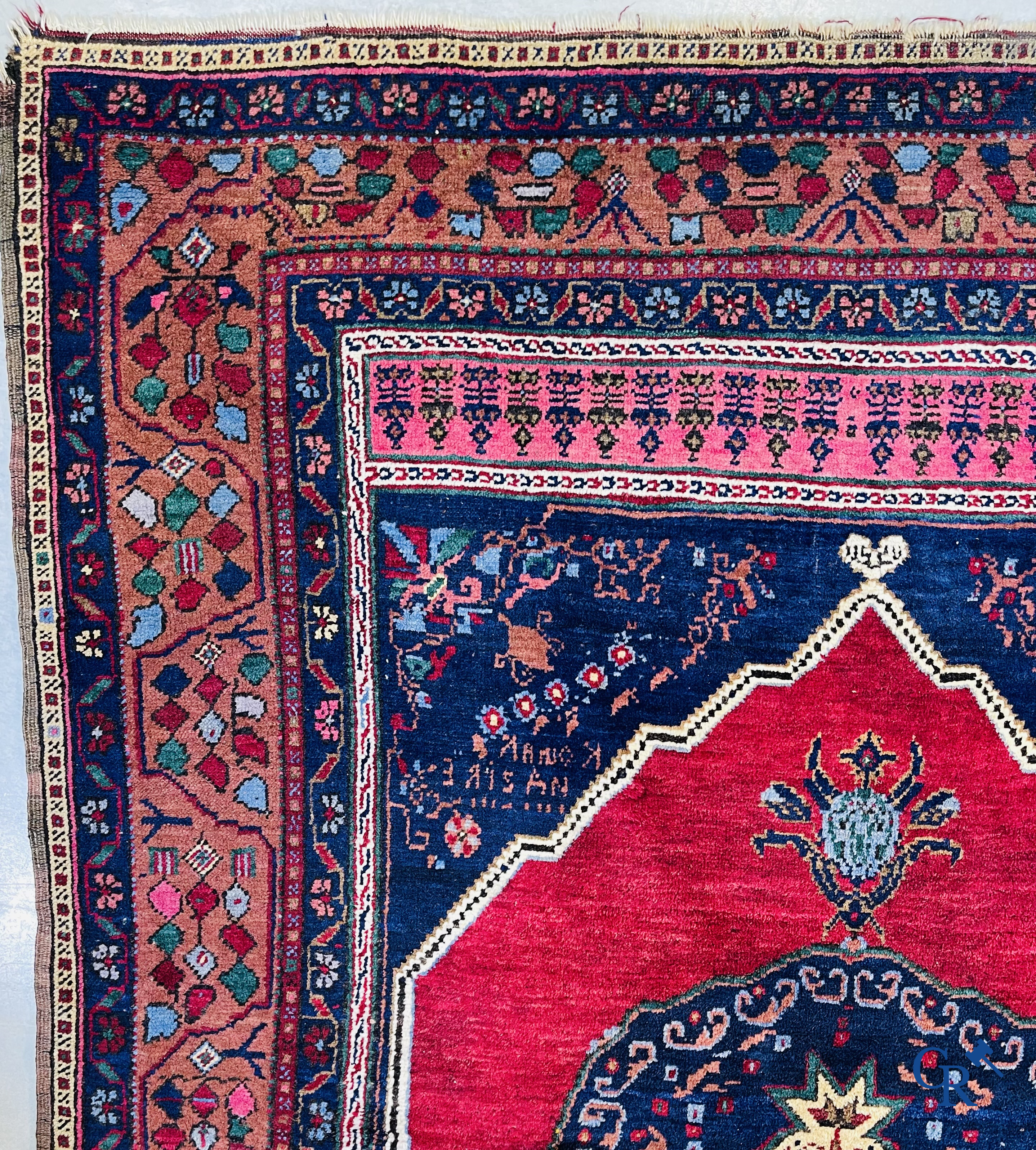 Oriental carpets, 2 antique hand-knotted Oriental carpets.